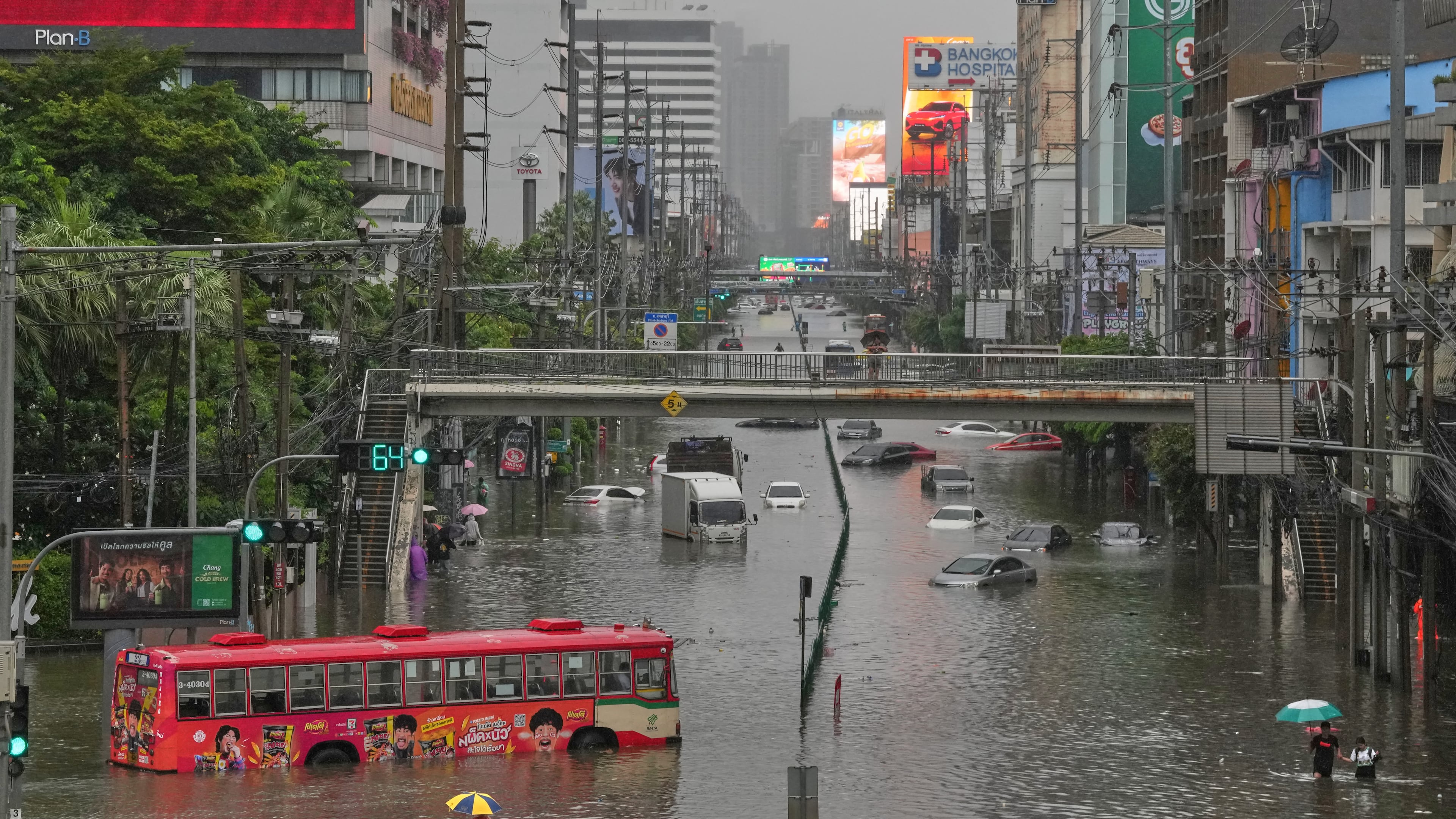 The streets are flooded after heavy rain in Bangkok, Thailand, Saturday, Sept. 26, 2026. (AP Photo/Sakchai Lalit)