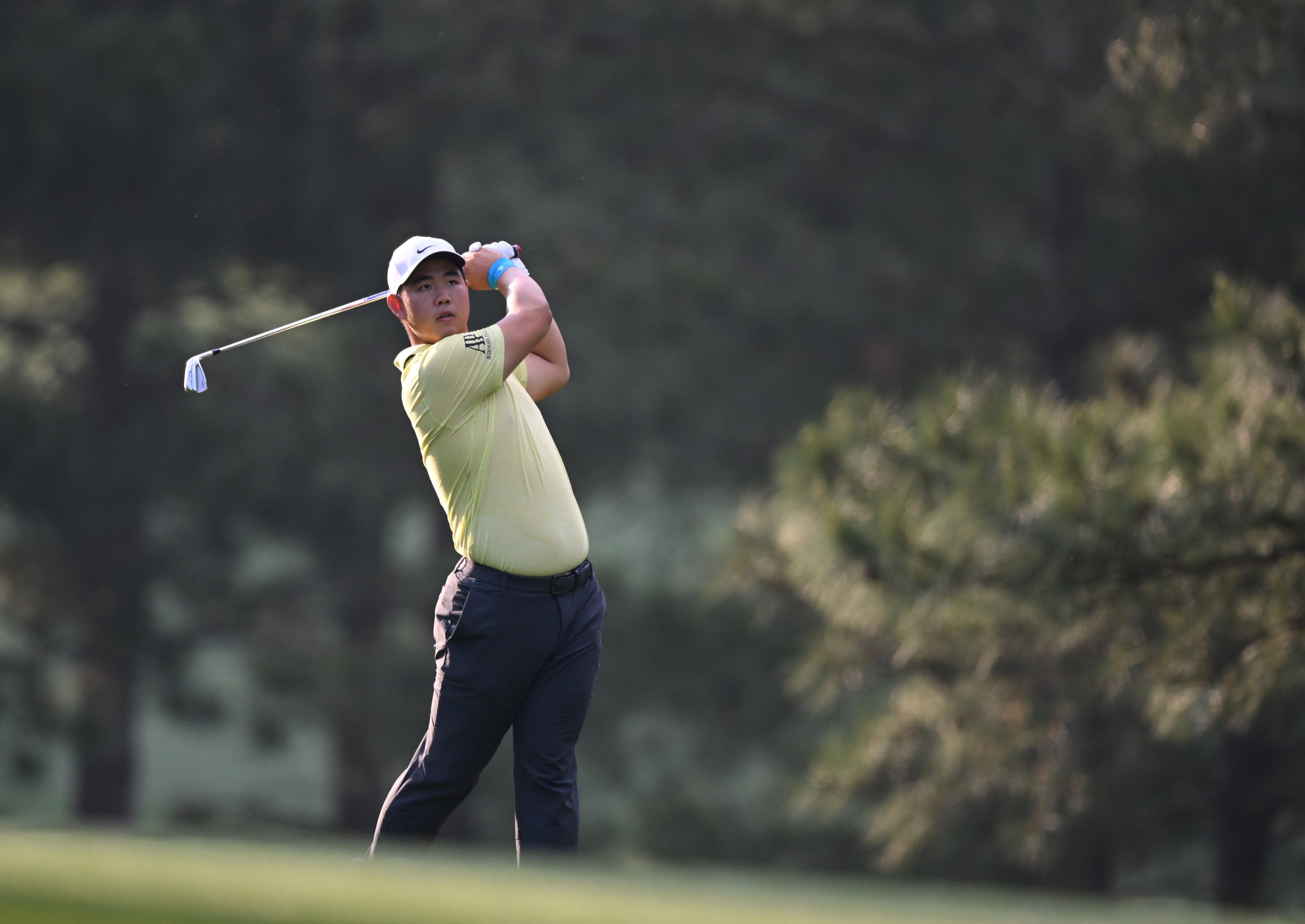 Tom Kim hits from the 17th fairway during first round of the 2023 Masters Tournament at Augusta National Golf Club, Thursday, April 6, 2023, in Augusta, Ga. (Hyosub Shin / Hyosub.Shin@ajc.com)