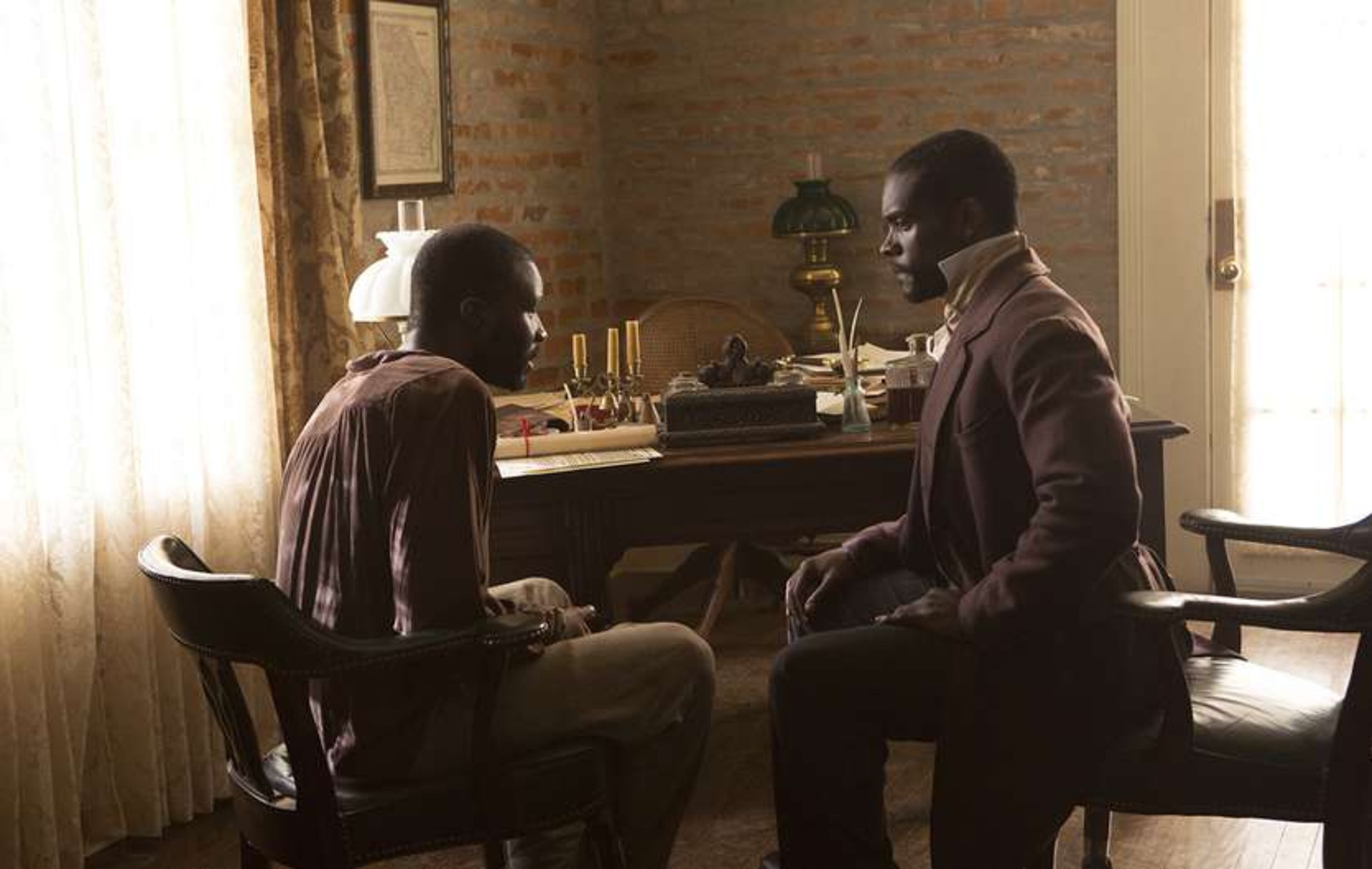 Anti-slavery activist and author William Still (Chris Chalk, right) talks with a runaway slave in WGN's new series "Underground." Photo: WGN AMERICA