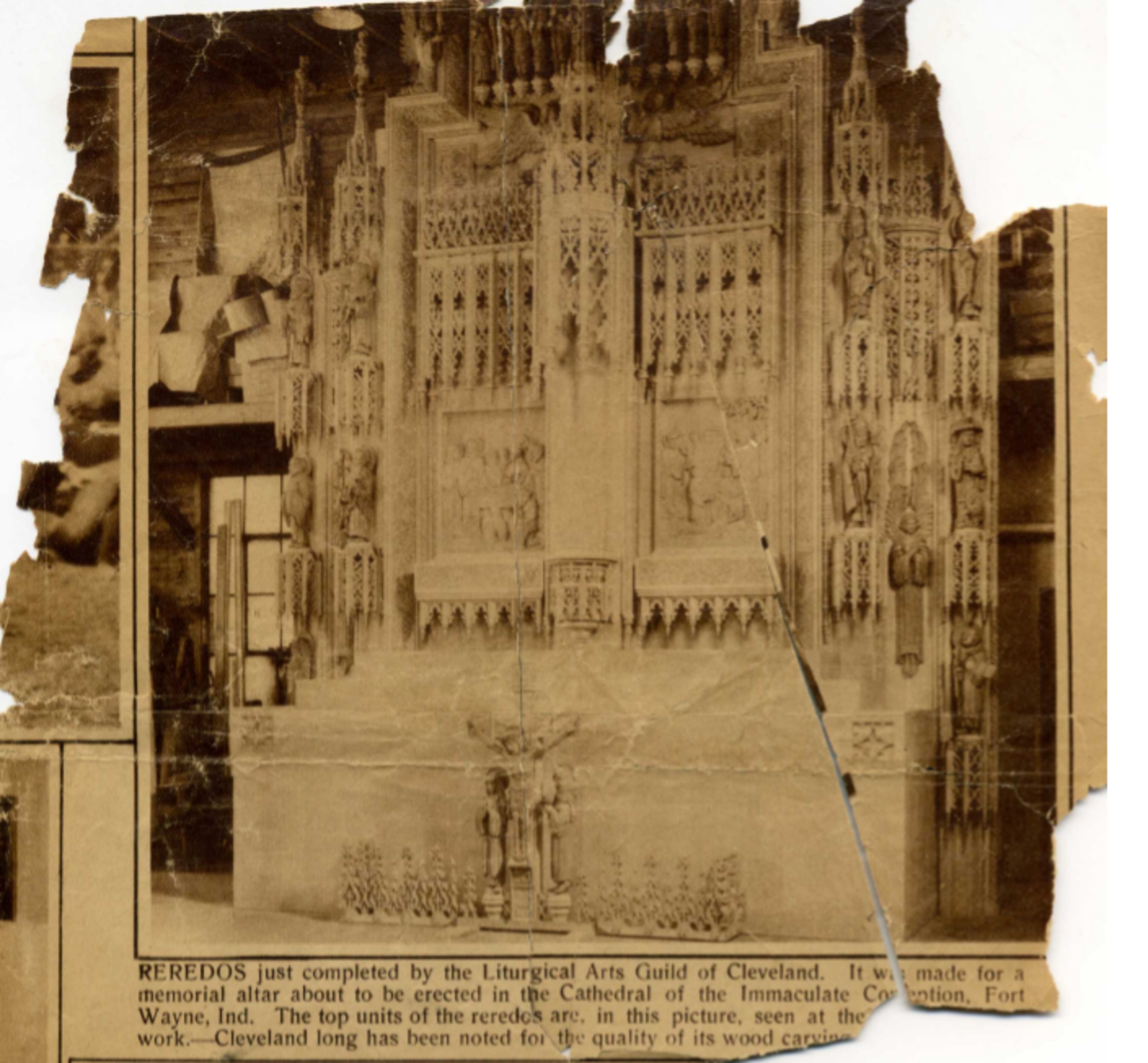 A Dec. 4, 1932 clipping from the Cleveland Plain Dealer, showing a reredos bound for the Cathedral of the Immaculate Conception in Fort Wayne, Ind., carved by the Liturgical Arts Guild of Cleveland.