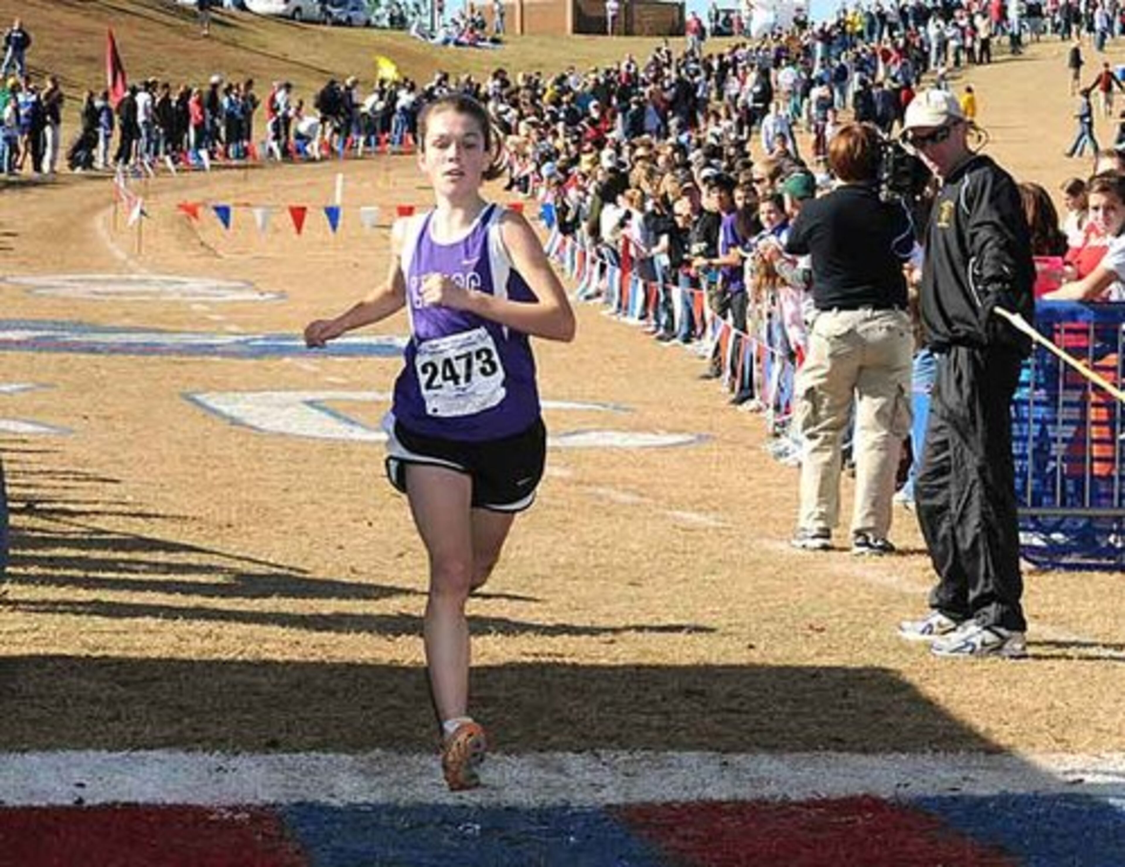 Girls 4AAAA -- Lakeside's Meghan Wetterhall crosses the finish line in first place with a time of 19:11.80.