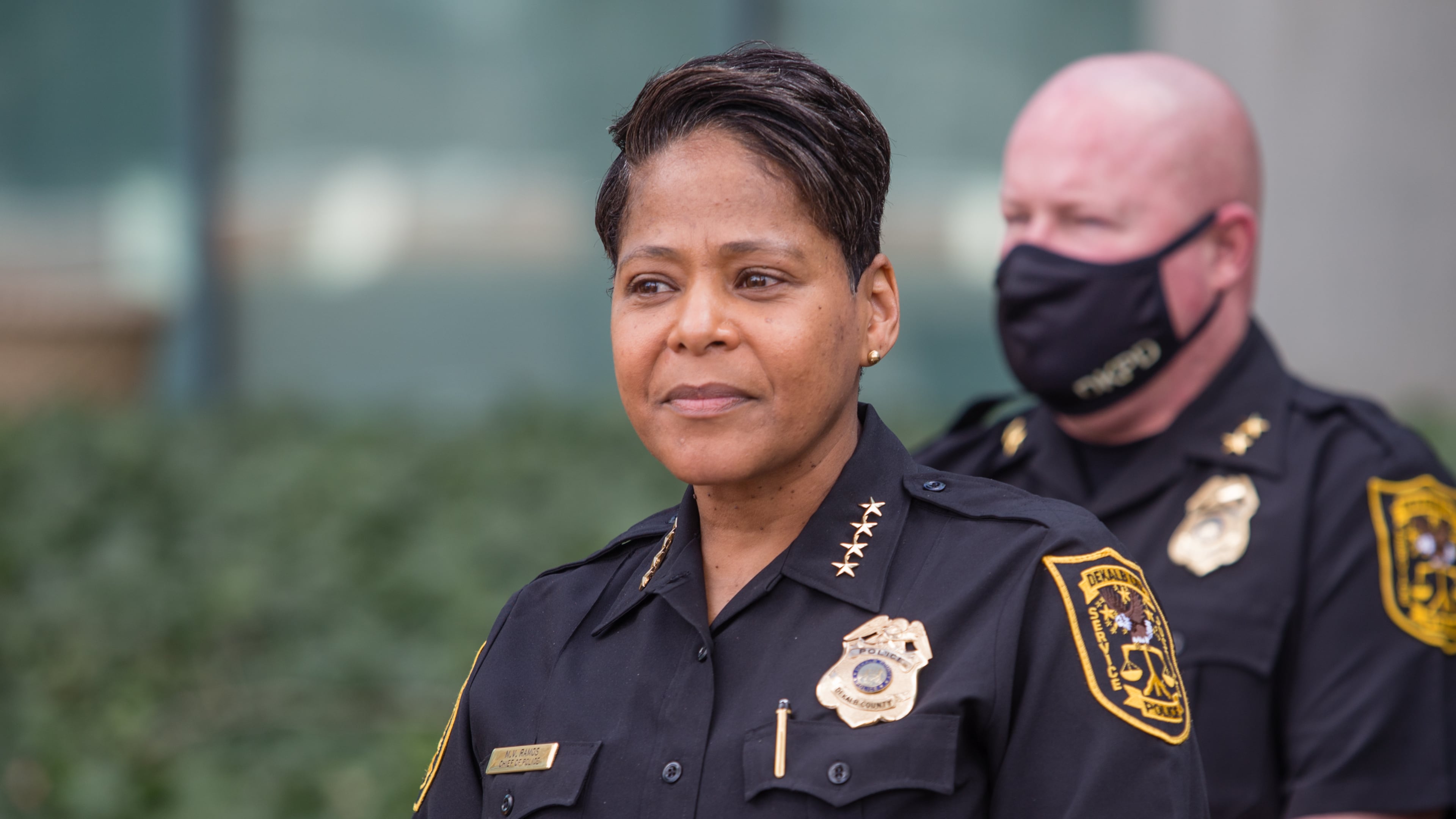 DeKalb County Police Chief Mirtha Ramos, at podium, leads a press conference Thursday, March 18, 2021 announcing the reunion of 1-year-old Royalty Grisby with her mother after the child was taken by a 14-year-old in a stolen car 12 hours earlier. (Jenni Girtman for The Atlanta Journal-Constitution)