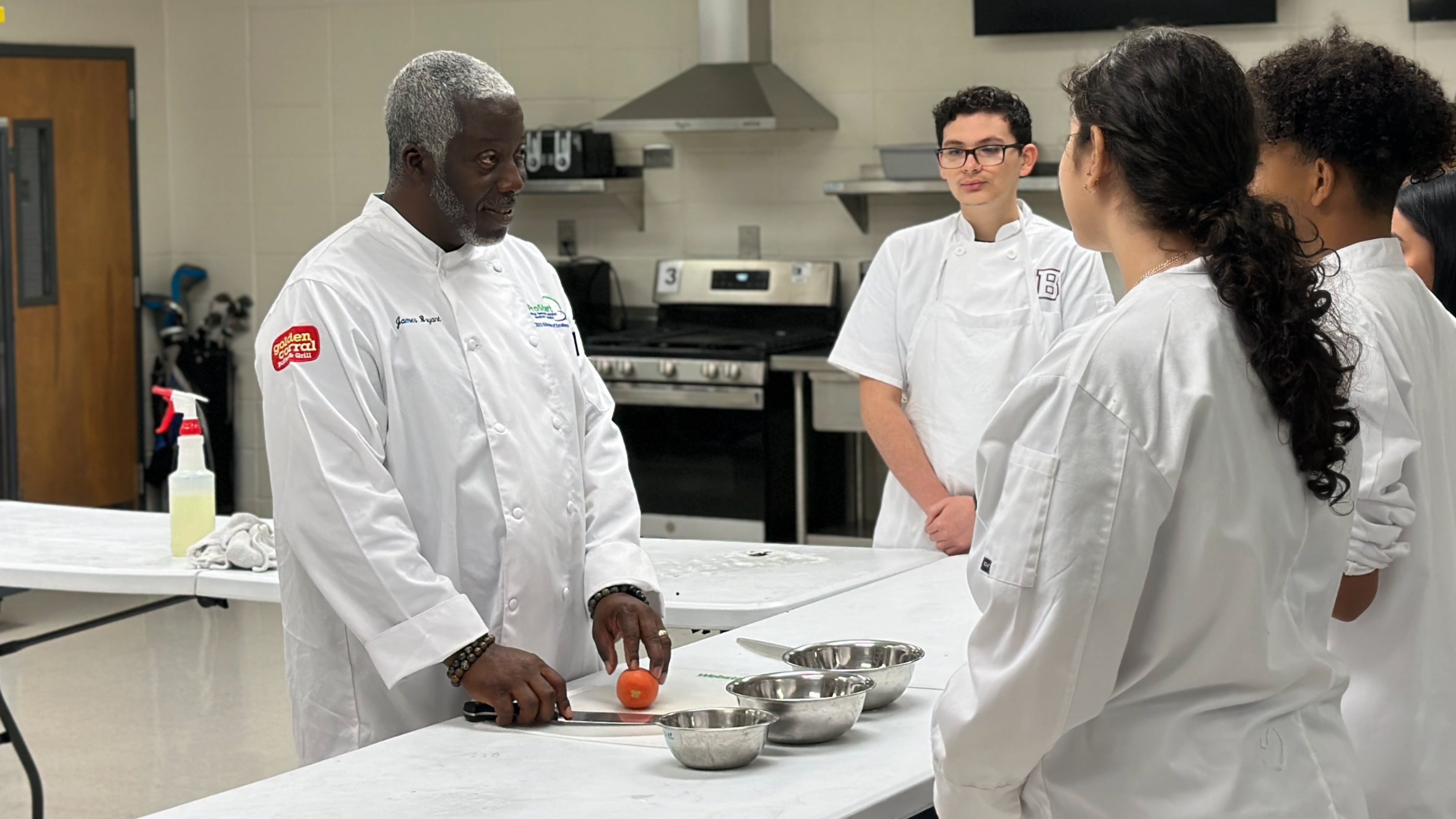 James Bryant (left), culinary instructor at Berkmar High, has been named the ProStart Teacher of the Year.