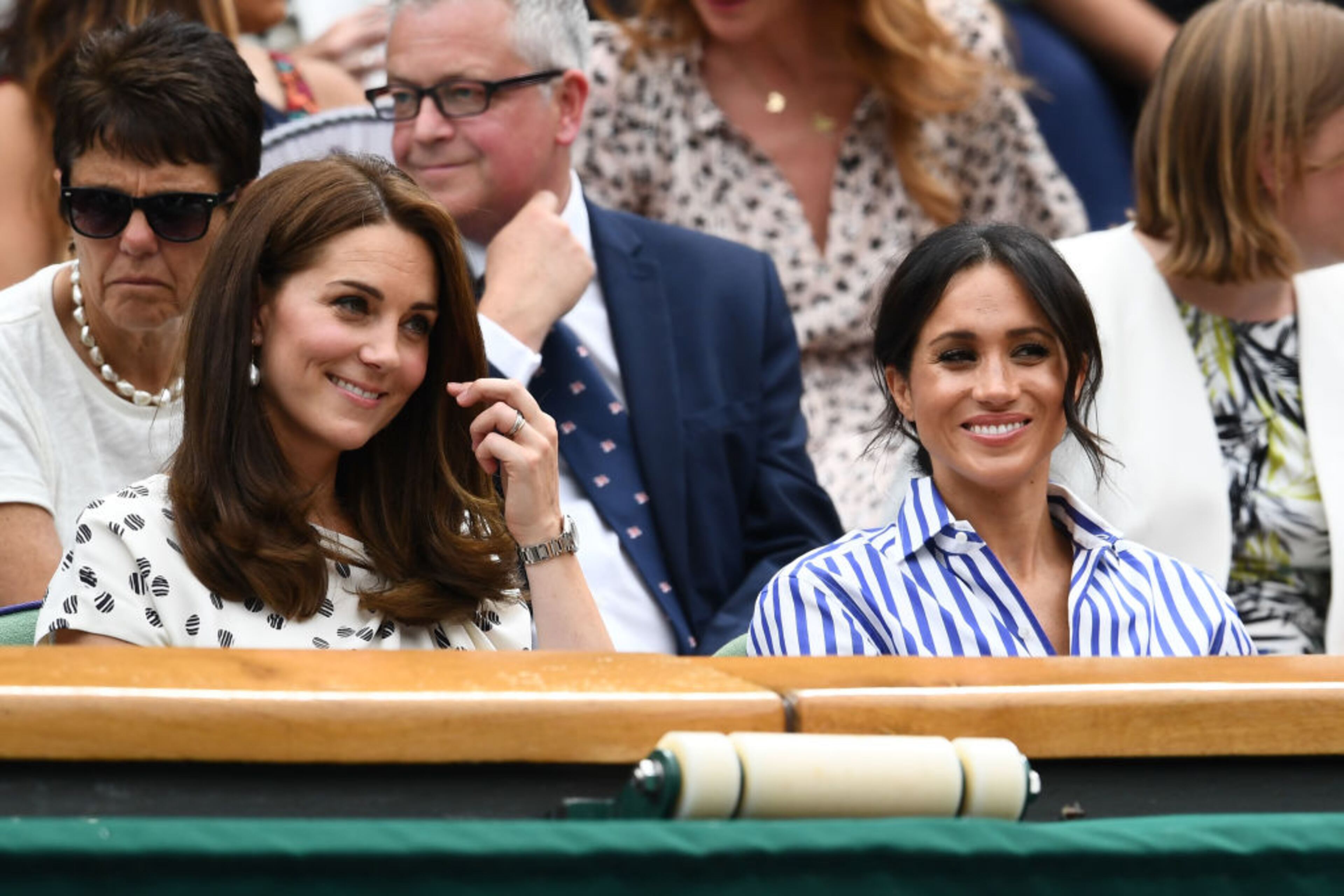 LONDON, ENGLAND - JULY 14: Catherine, Duchess of Cambridge and Meghan, Duchess of Sussex attend day twelve of the Wimbledon Lawn Tennis Championships at All England Lawn Tennis and Croquet Club on July 14, 2018 in London, England. (Photo by Clive Mason/Getty Images)