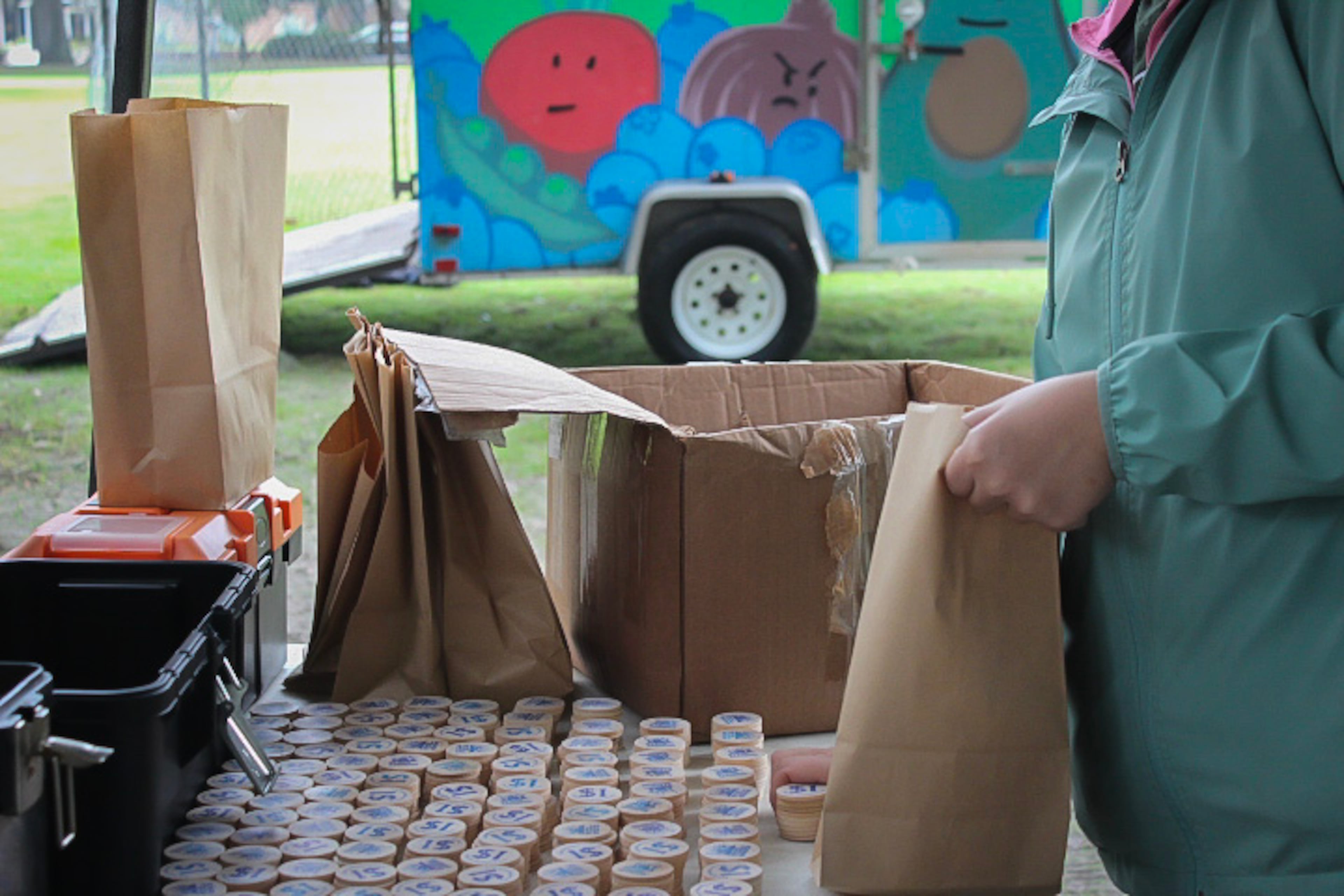 The Forsyth Farmers Market exchanges food stamps tokens that can be redeemed at the market's vendors. The market currently doubles the value of the government-issued coupons. (Photo courtesy of Forsyth Farmers Market)