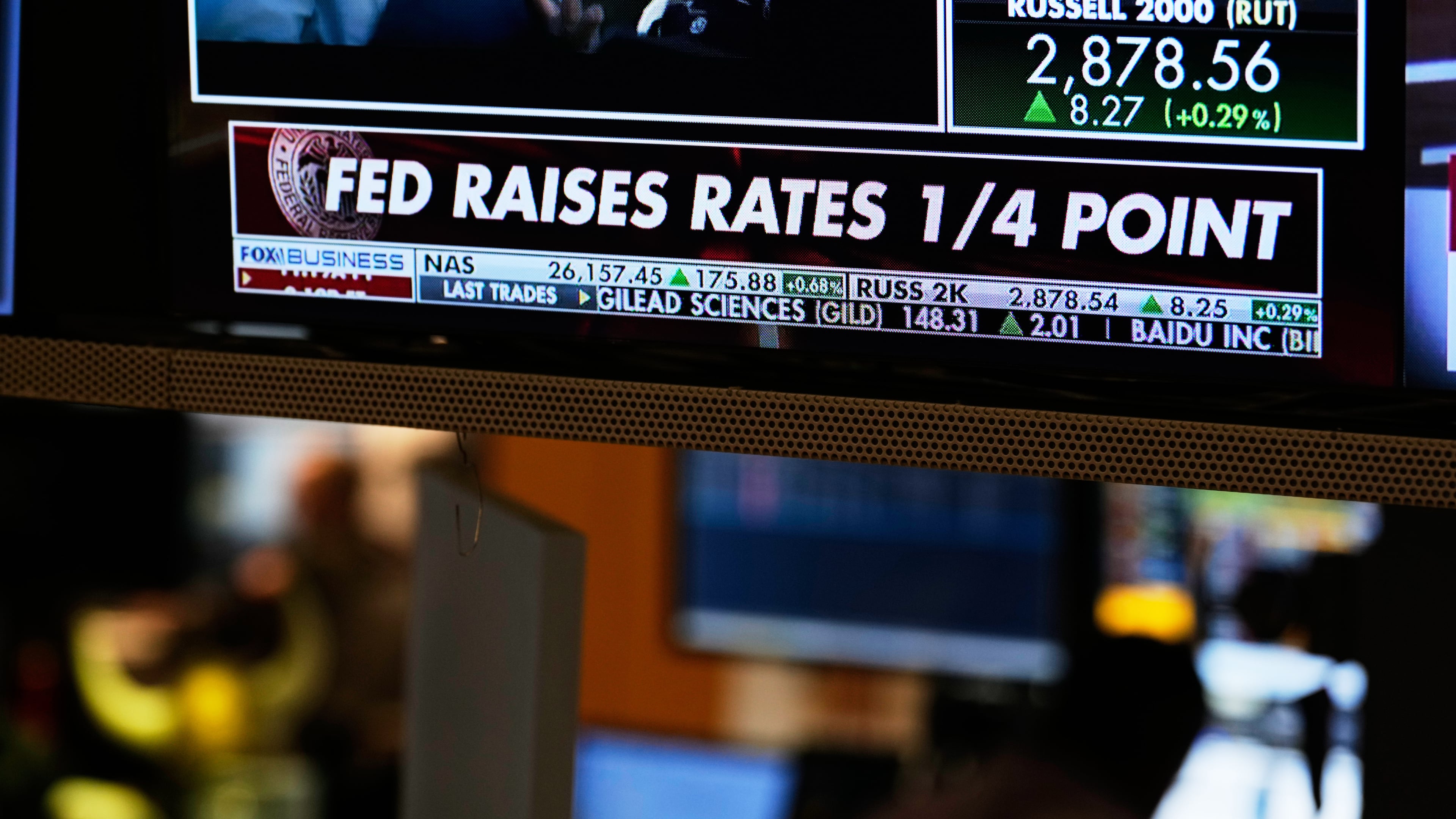 Screens display financial information on the floor at the New York Stock Exchange in New York, Wednesday, Sept. 16, 2026. (AP Photo/Seth Wenig)
