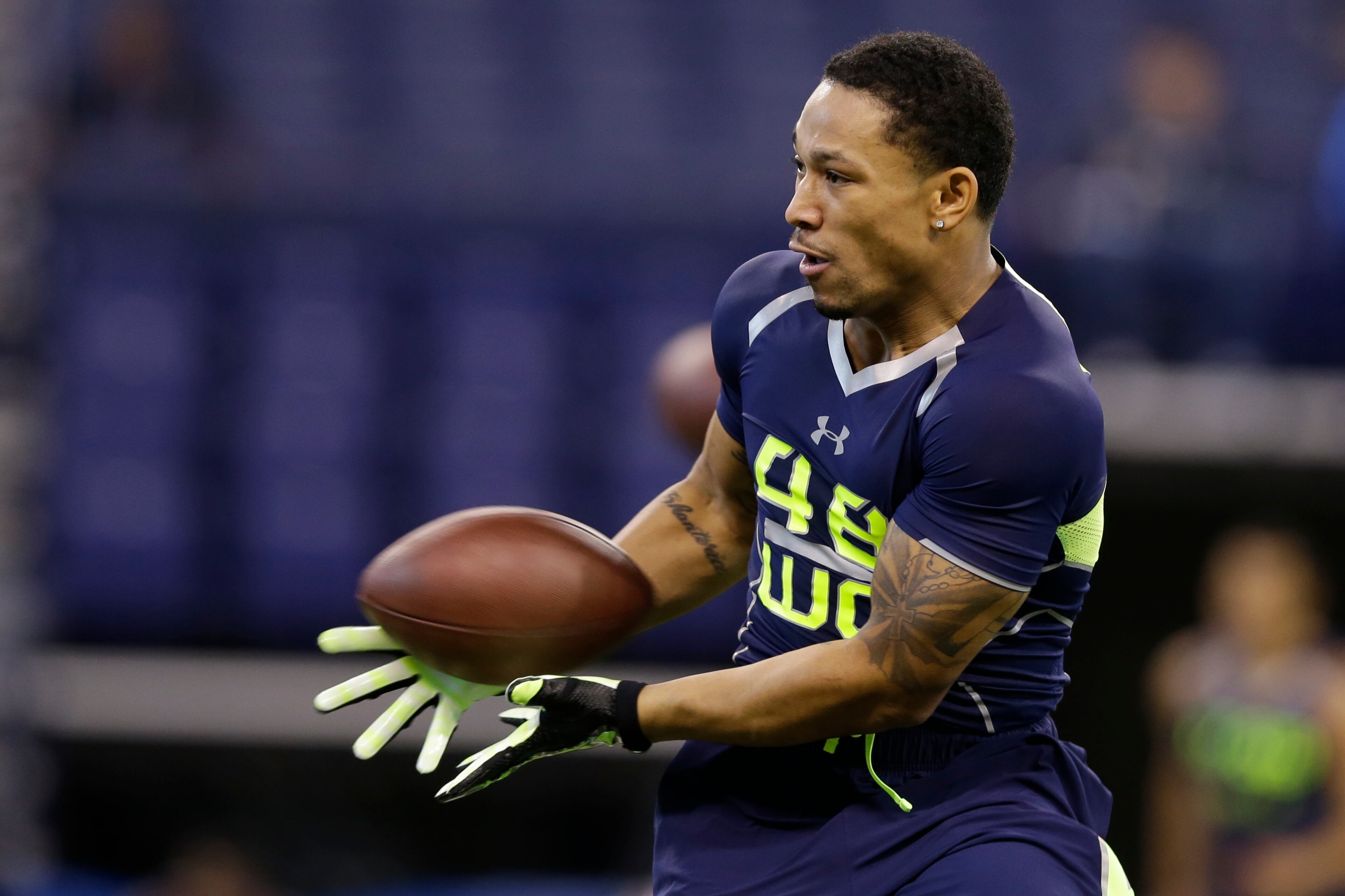 Georgia State wide receiver Albert Wilson makes a catch during a drill at the NFL football scouting combine in Indianapolis, Sunday, Feb. 23, 2014. (AP Photo/Michael Conroy)