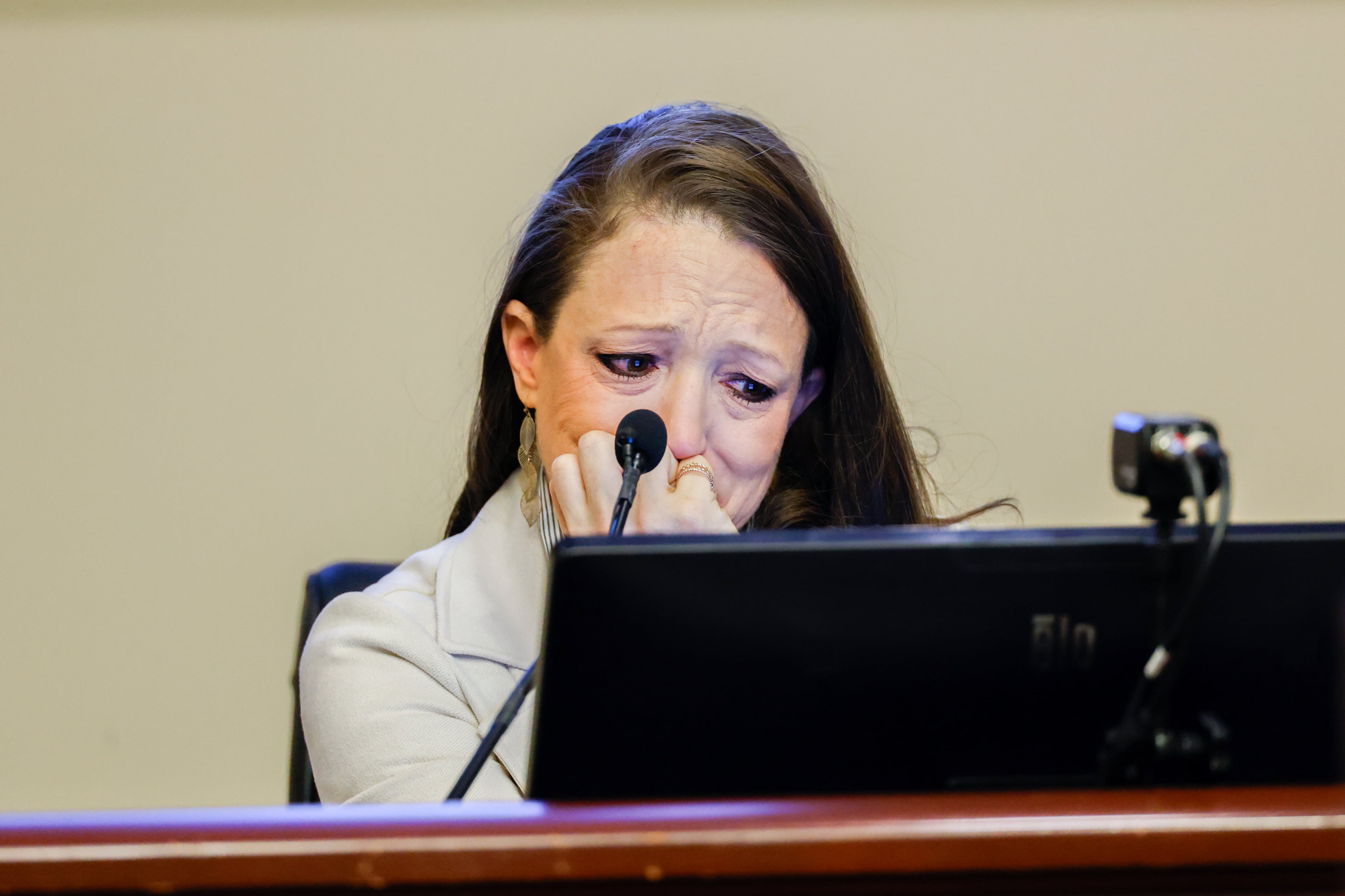Marcee Gray, the mother of Apalachee High School shooting suspect Colt Gray and wife of Colin Gray, becomes emotional while testifying in Colin’s trial at Barrow County Courthouse in Winder on Monday, Feb. 23, 2026. Colin Gray, Colt’s father, is facing 29 charges related to the September 2024 shooting. (Arvin Temkar/AJC)