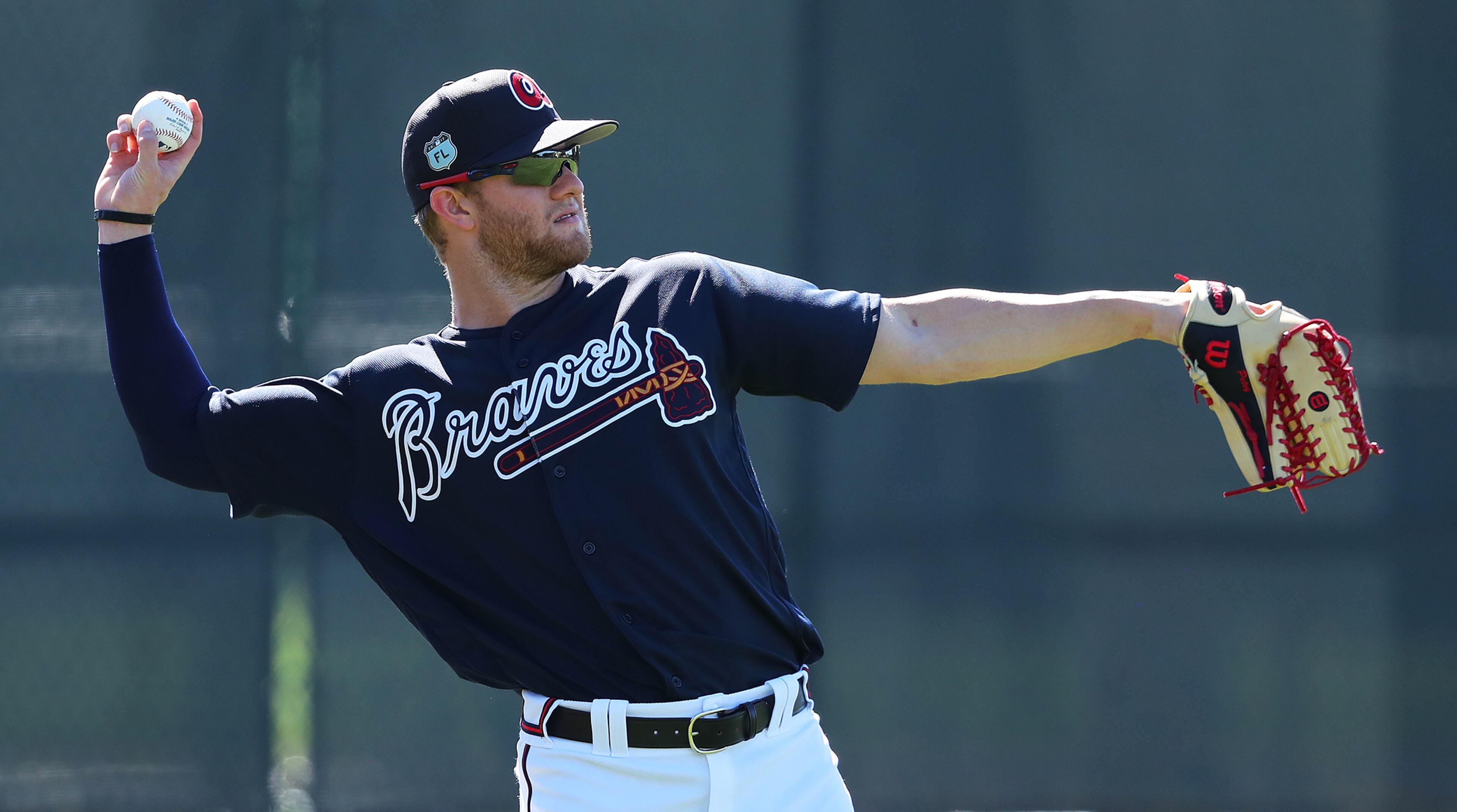 February 19, 2017, Lake Buena Vista, FL: Atlanta Braves outfielder Dustin Peterson fields a hit during spring training practice on Sunday Feb. 19, 2017, at the ESPN Wide World of Sports in Lake Buena Vista. Curtis Compton/ccompton@ajc.com
