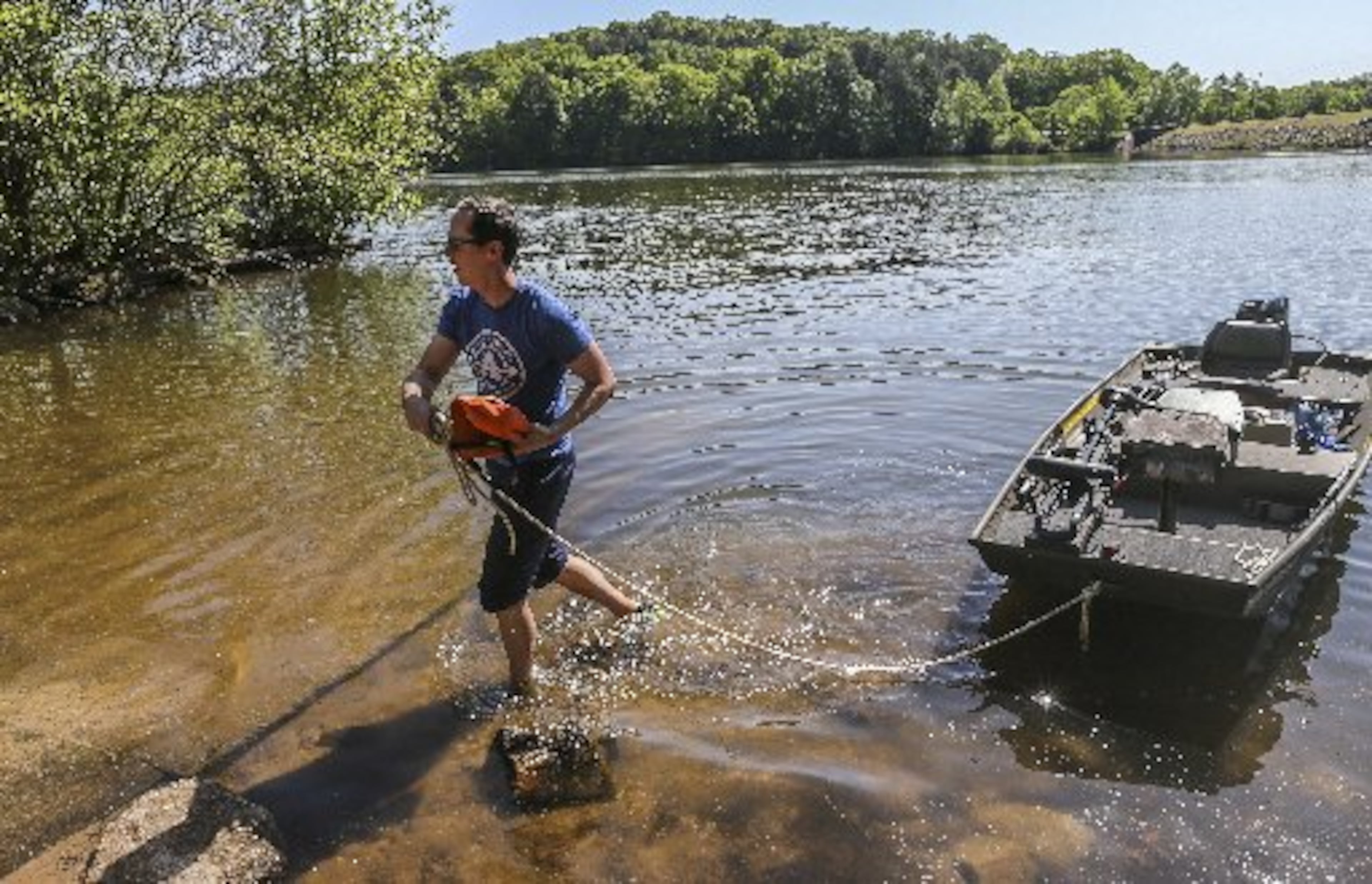 Mike Sauer spent a day enjoying the peace and quiet of Stone Mountain Lake on Tuesday. JOHN SPINK / JSPINK@AJC.COM