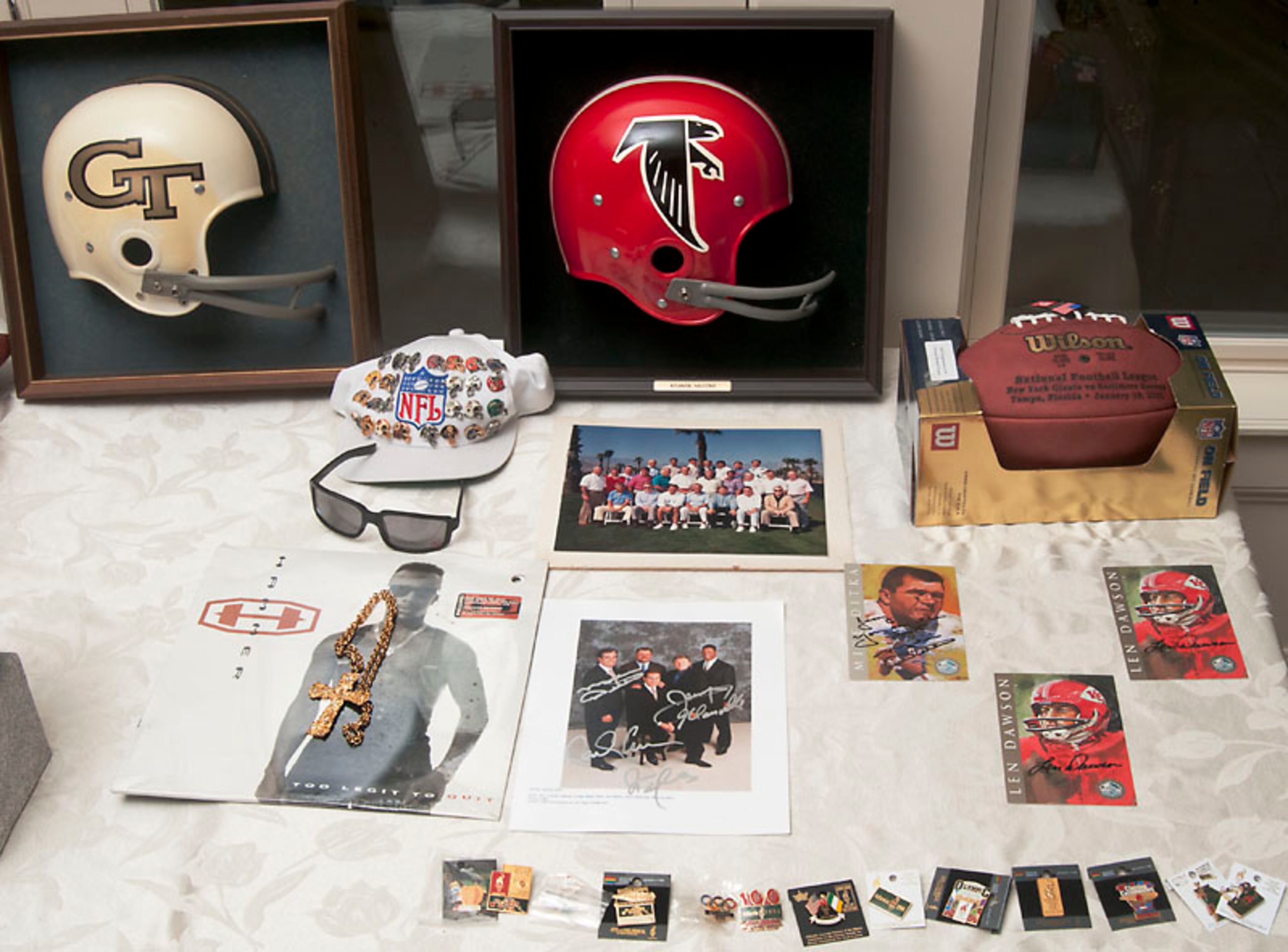 Memorabilia from Jerry Glanville's days in the NFL and as a linebackers coach at Georgia Tech is included in the lot. Also for sale is a gold chain from rap artist MC Hammer (left). Donna Davis Estate Sales in Dawsonville is handling the sale, which is open to the public from May 15 to May 17.