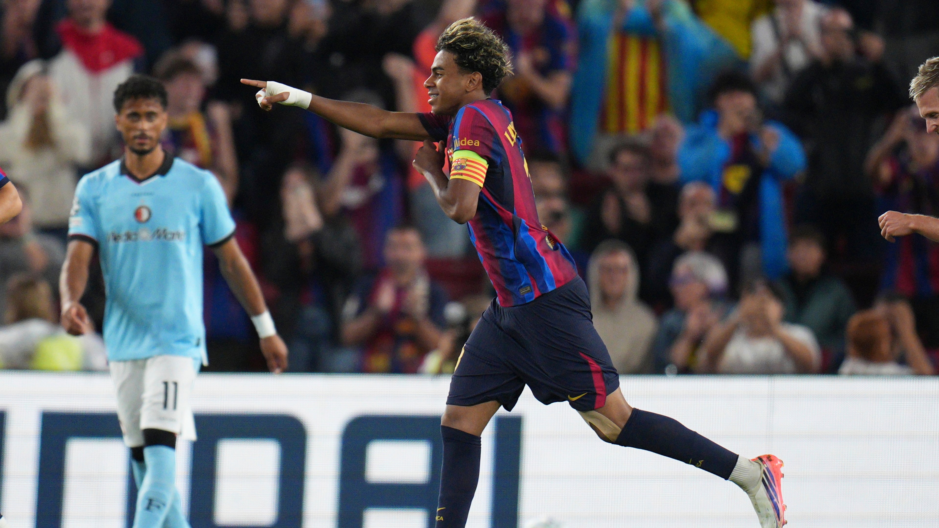 Barcelona's Lamine Yamal celebrates after scoring his side's fourth goal during the Champions League opening phase soccer between Barcelona and Feyenoord in Barcelona, Spain, Wednesday, Sept. 9, 2026.(AP Photo/Emilio Morenatti)