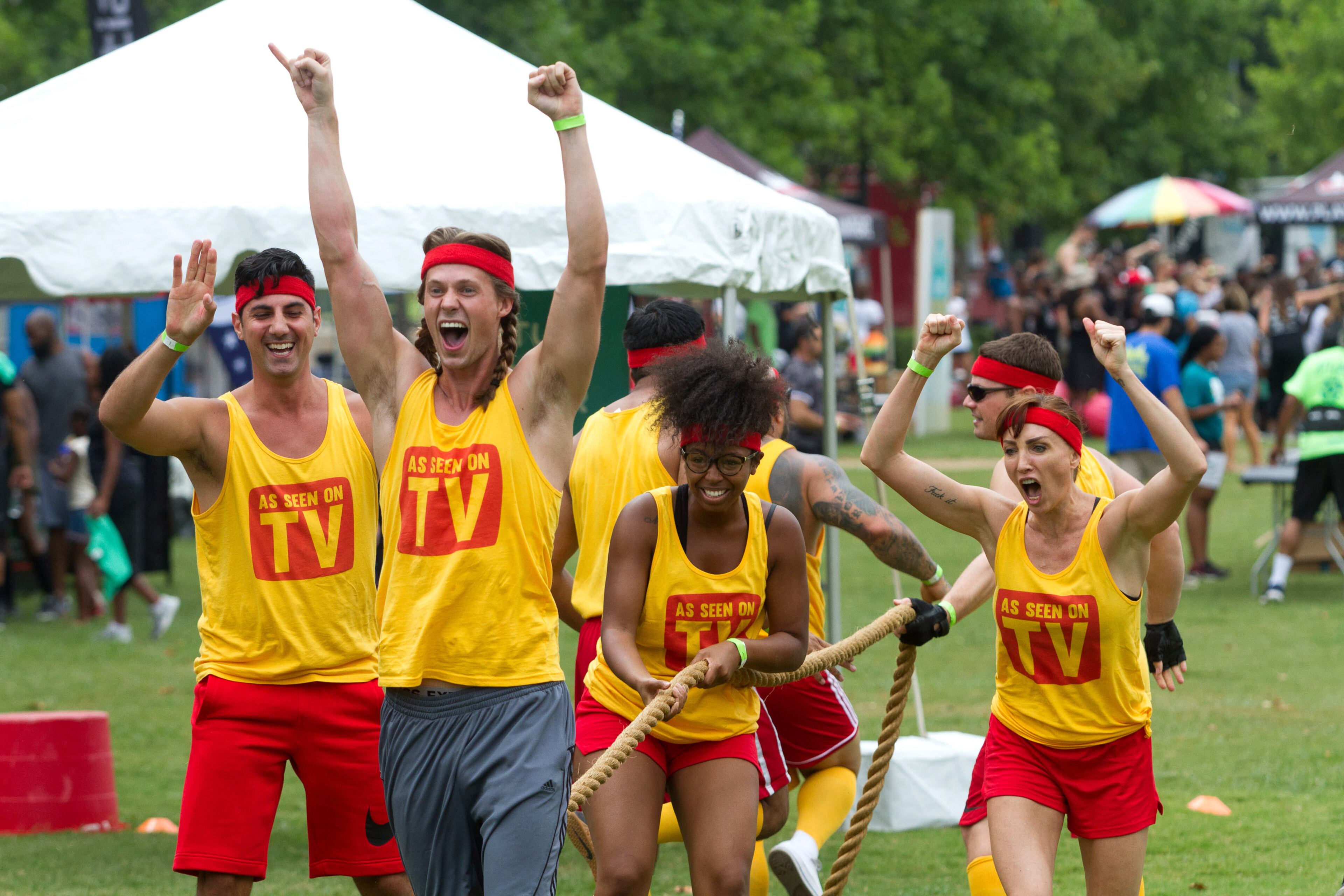 The As Seen On TV team celebrates after winning the Tug of War competition during the Atlanta Field Day event in Historic Fourth Ward Park Saturday, July 14, 2018. STEVE SCHAEFER / SPECIAL TO THE AJC
