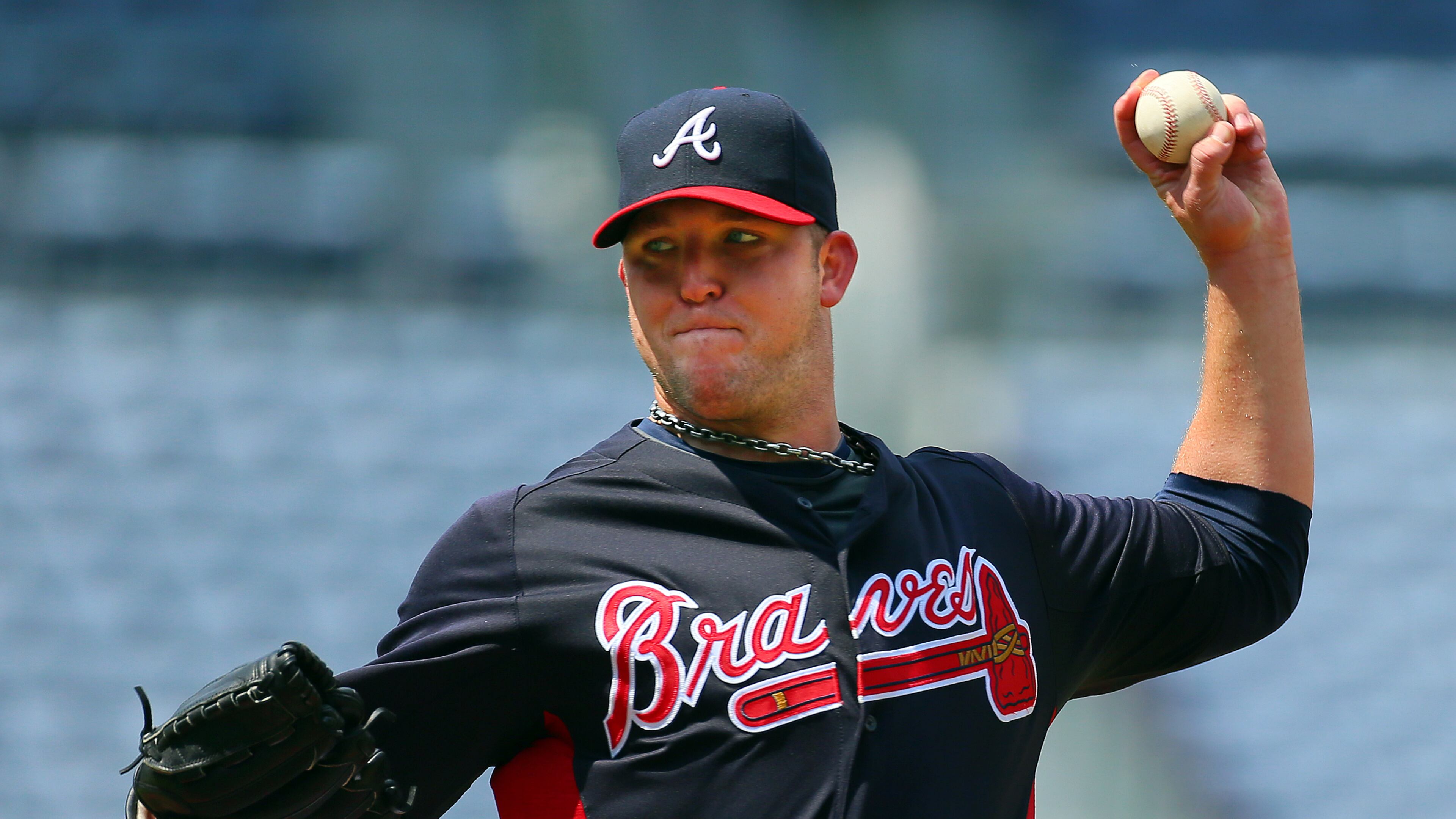 Braves pitcher Paul Maholm (wrist), who has been on the disabled list, throws from the mound at batting practice before the Braves play the Phillies at Turner Field on Monday, August 12, 2013, in Atlanta.