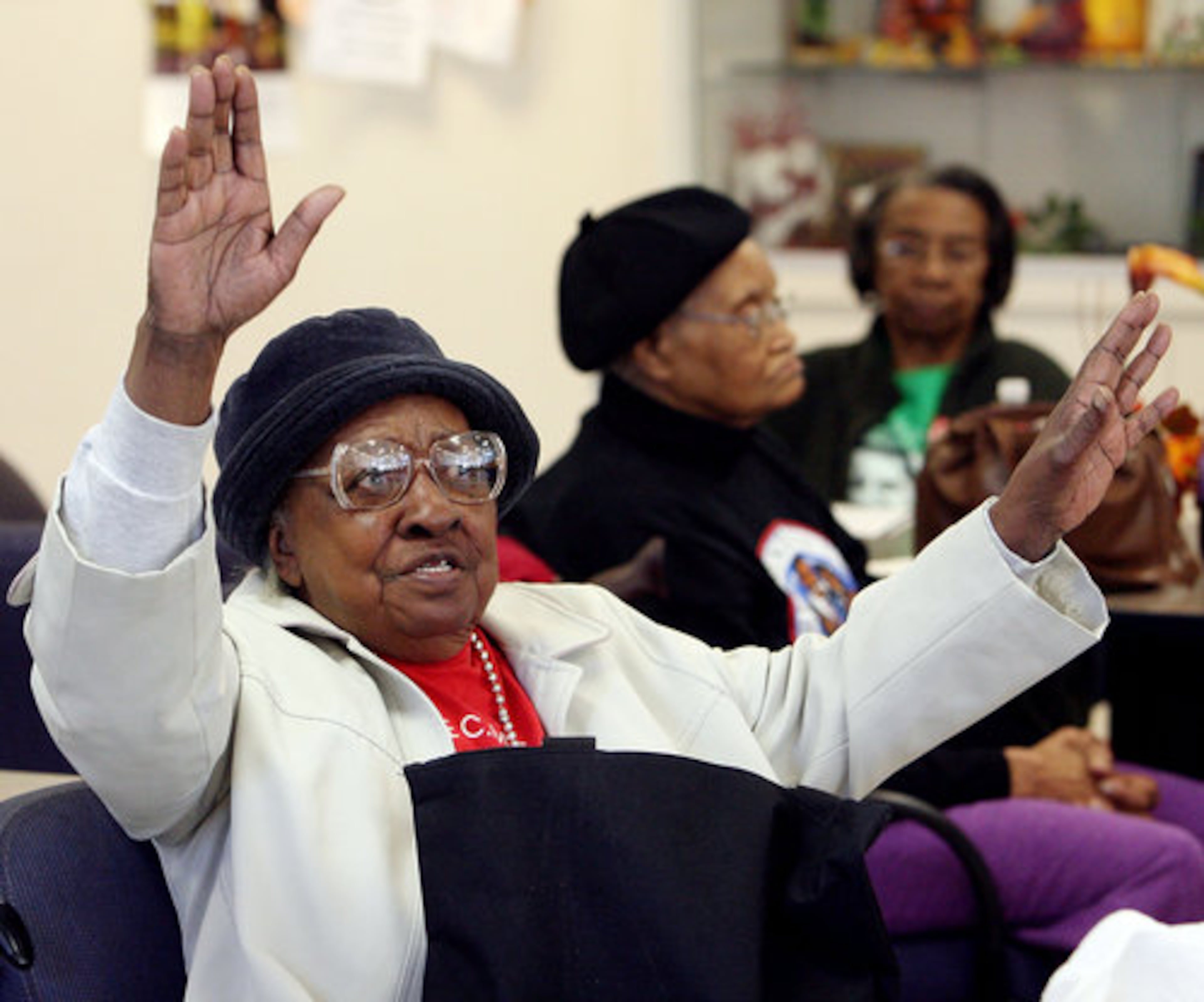 Eighty six year-old Doris Freeman prays before watching the historic inauguration of Barack Obama at the Dogwood Neighborhood Senior Center in Atlanta on Tuesday, January 20th.