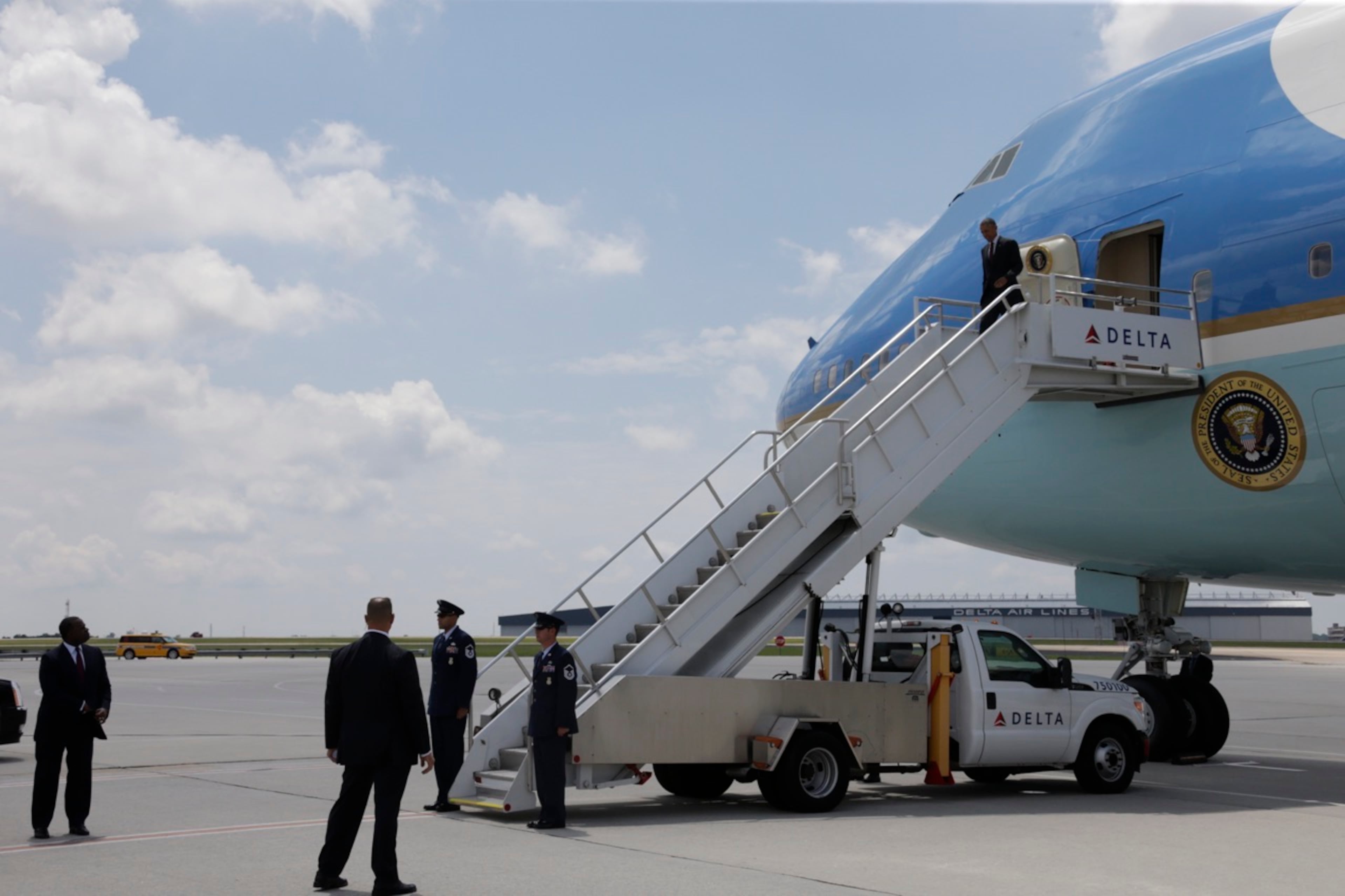 President Barack Obama exits Air Force One as he arrives at Hartsfield-Jackson International Airport for a speech to the Disabled American Veterans and a fundraiser, Monday, August 1, 2016. BOB ANDRES / BANDRES@AJC.COM