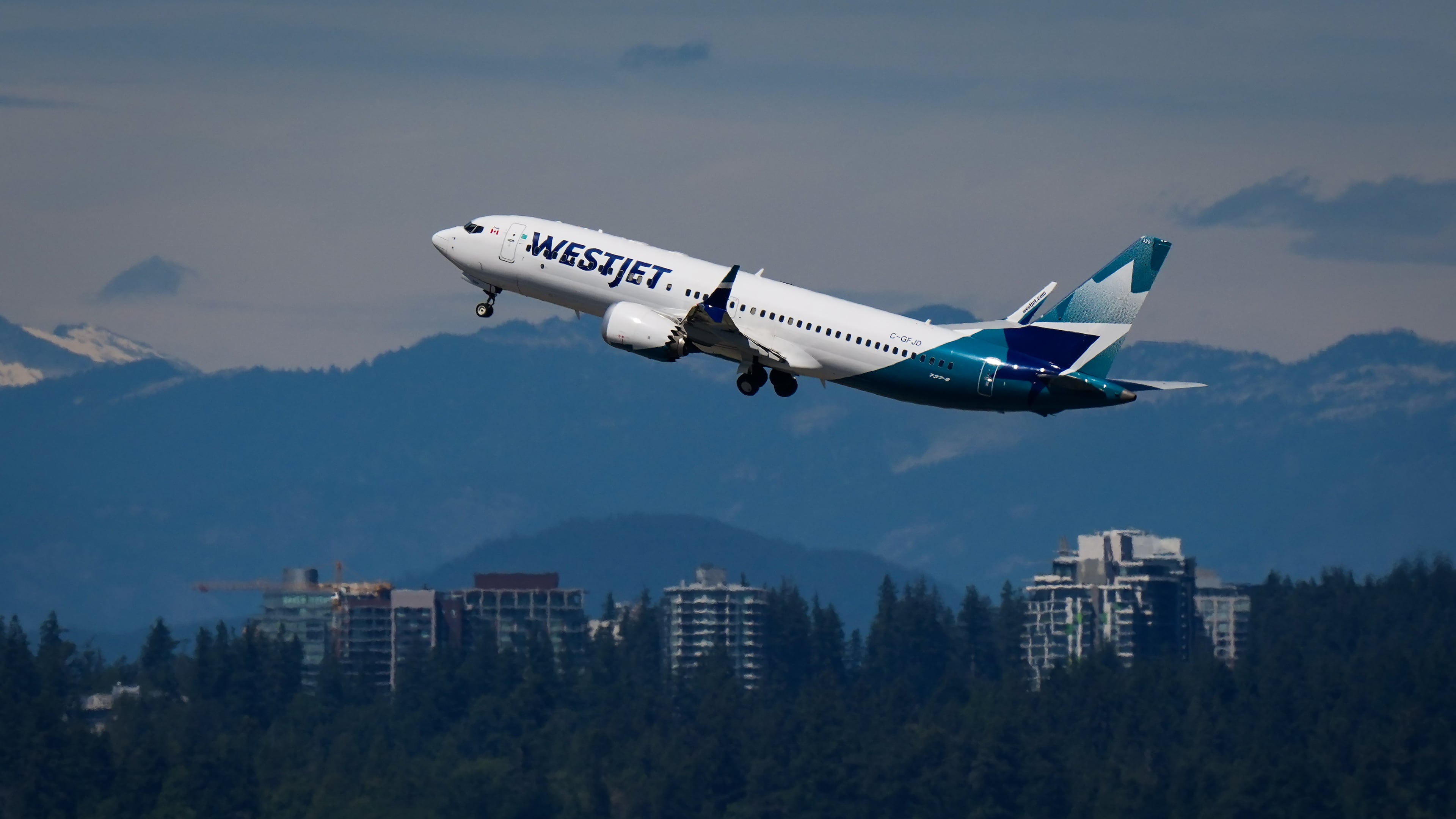 A WestJet Boeing 737 Max aircraft takes off from Vancouver International Airport in Richmond, British Columbia, Canada, on Friday, July 31, 2026. (Darryl Dyck/The Canadian Press via AP)