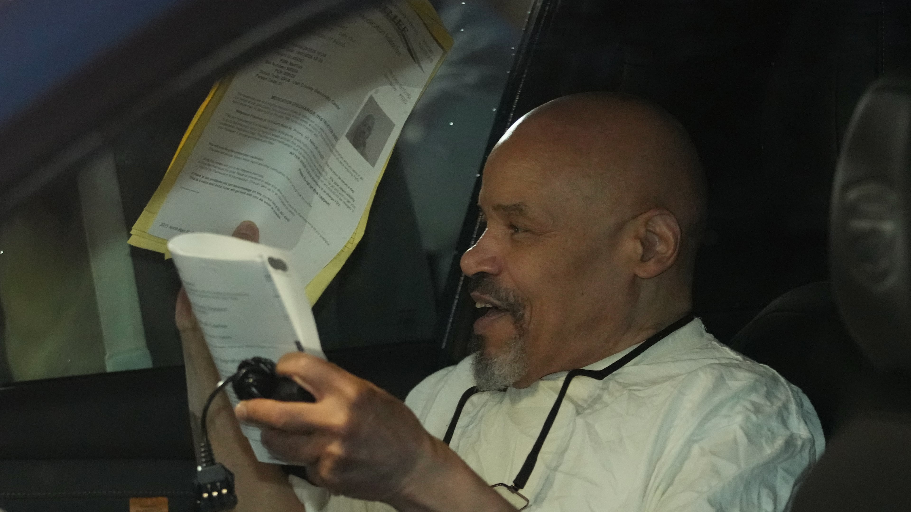 Douglas Stewart Carter sits in a car after he was released out of the Utah County Jail as a Utah judged ordered his release from jail on Monday Sept. 28, 2026, in Spanish Fork, Utah. (AP Photo/George Frey)
