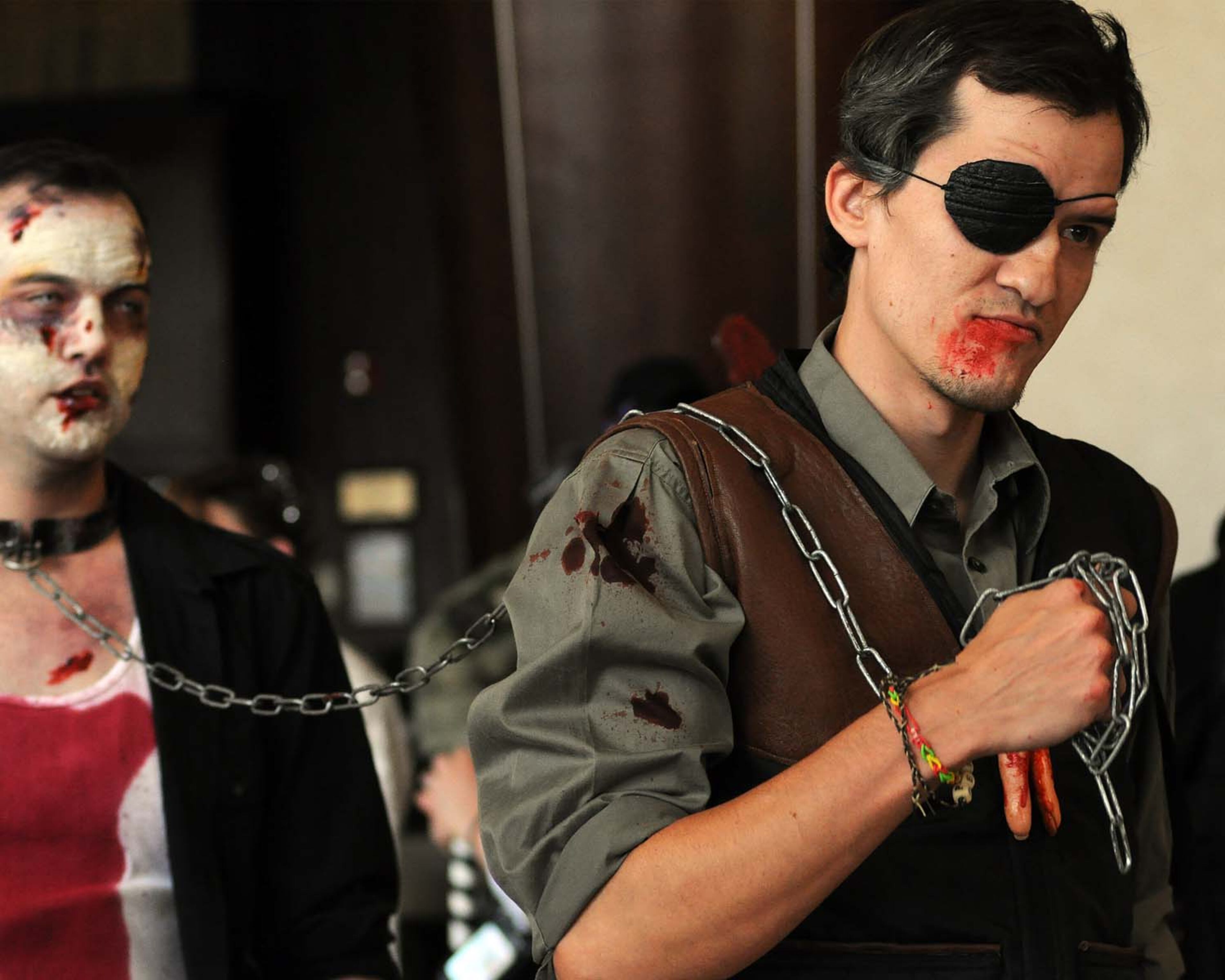 A pack of blood-thirsty zombies marched on the Rosen Centre Hotel in Orlando, Florida to kick off Spooky Empire's annual May-Hem horror convention.