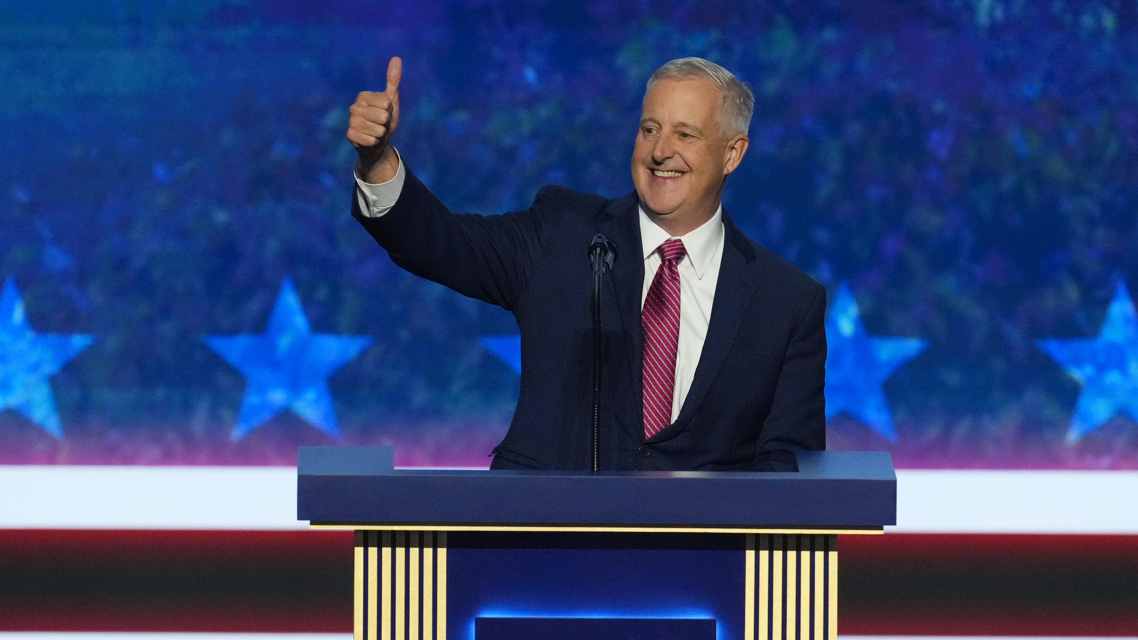 Michael Whatley, North Carolina senatorial candidate, greets delegates as he takes the stage at the Republican convention in Dallas, Wednesday, Sept. 9, 2026. (AP Photo/Tony Gutierrez)