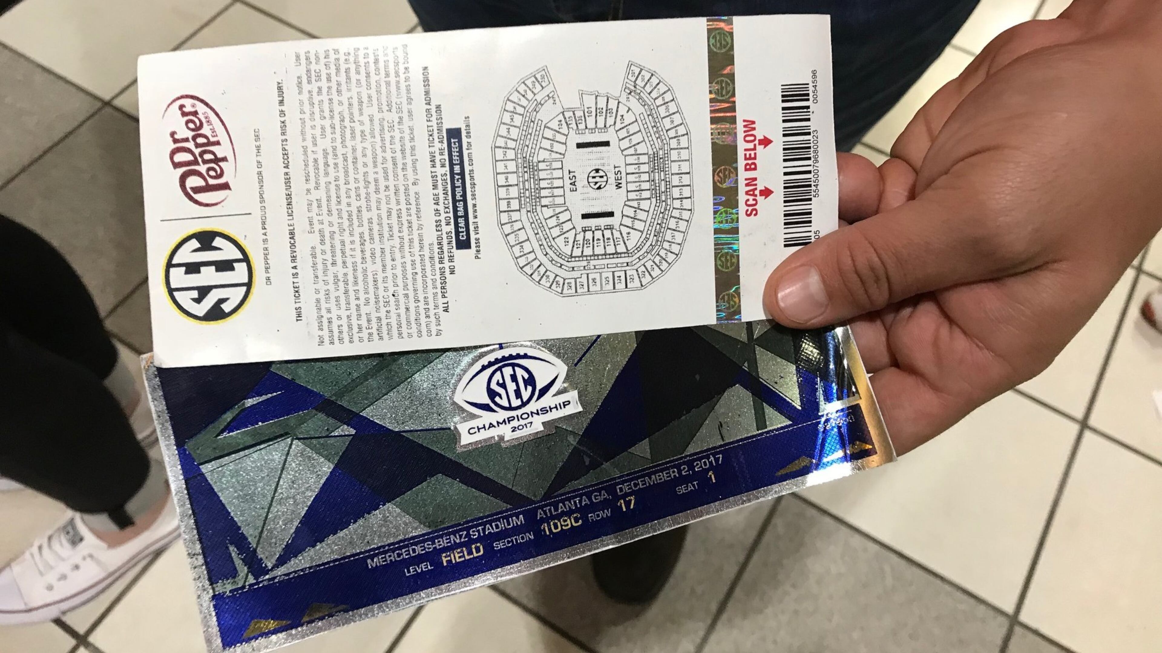 Counterfeit tickets remain a problem in college football. Georgia fans who drove to Atlanta Dec. 2 for the SEC championship game with Auburn bought these tickets for $300 each before finding out at the gate that they were fakes. College Football Playoff officials warn against buying printed tickets from scalpers. BO EMERSON / BEMERSON@AJC.COM
