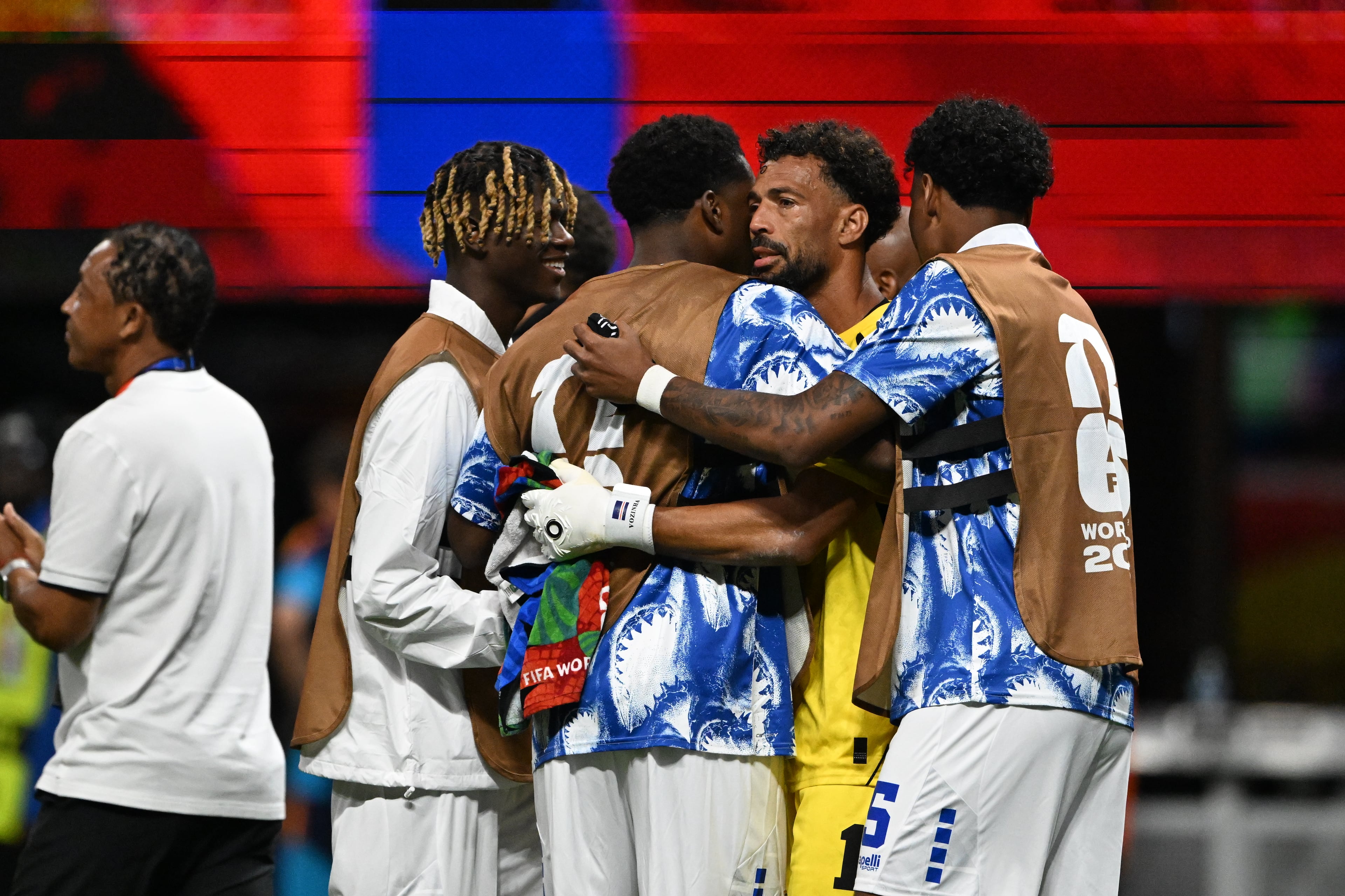 Teammates congratulate Cape Verde goalkeeper Vozinha after 0-0mdraw against Spain in Group H match at Atlanta Stadium (Mercedes-Benz Stadium) on Monday, June 15, 2026. (Hyosub Shin/AJC)