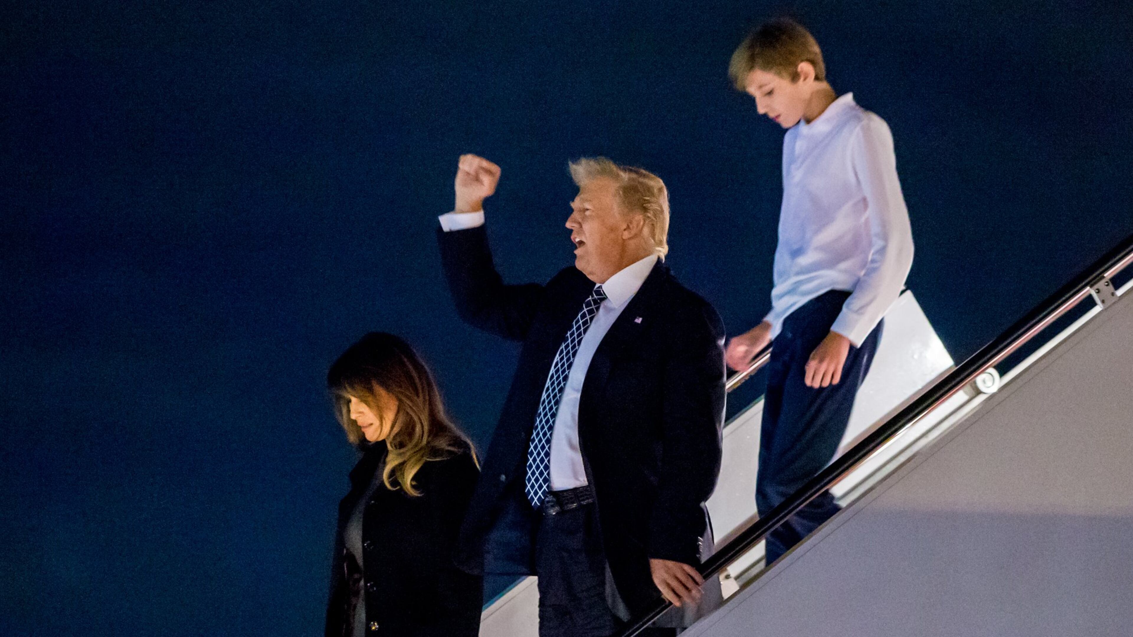 President Donald Trump, first lady Melania and their son, Barron, arrive on Air Force One at Palm Beach International Airport on Jan. 12, 2018 to spend the weekend at Mar-a-Lago. It was Trump’s 11th visit to Palm Beach in the first year of his presidency. (Richard Graulich / The Palm Beach Post)