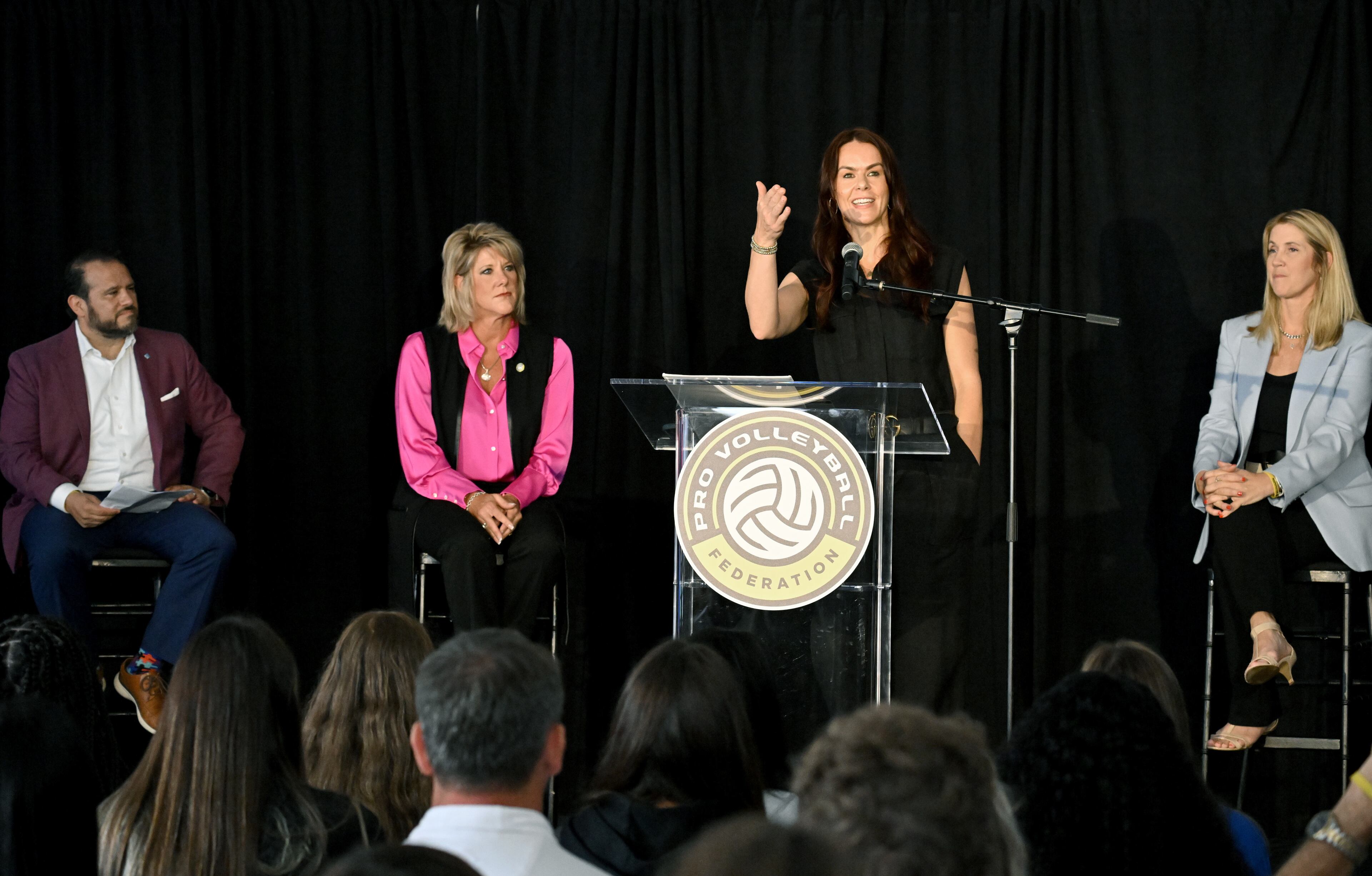 Former professional volleyball player, Kele Eveland, speaks during the event. (Hyosub Shin / Hyosub.Shin@ajc.com)