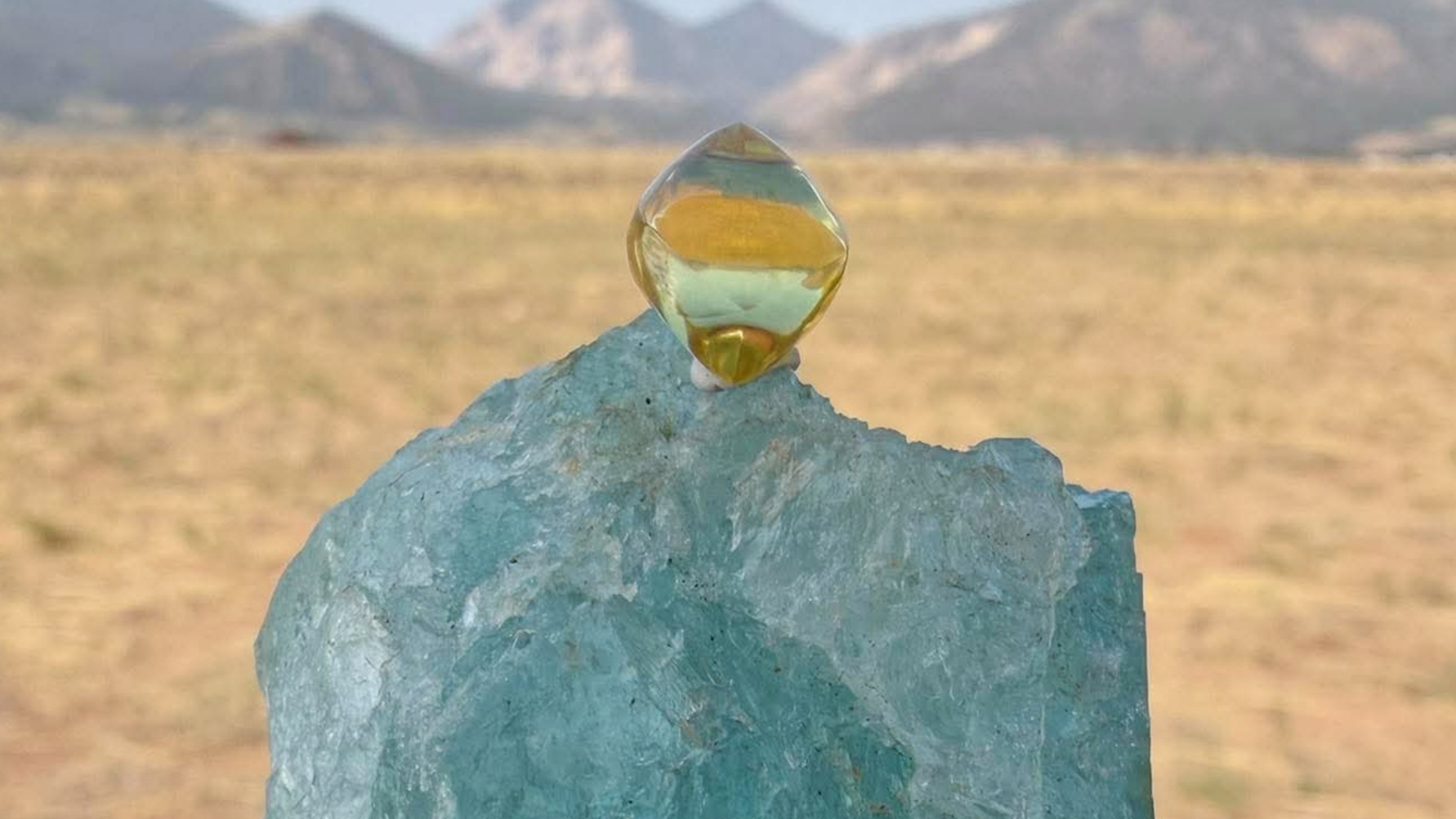This photo provided by Jack Pearadin shows the American Dream diamond sitting on top of a large gem on Aug. 9, 2026, in Buena Vista, Colo. (Jack Pearadin via AP)