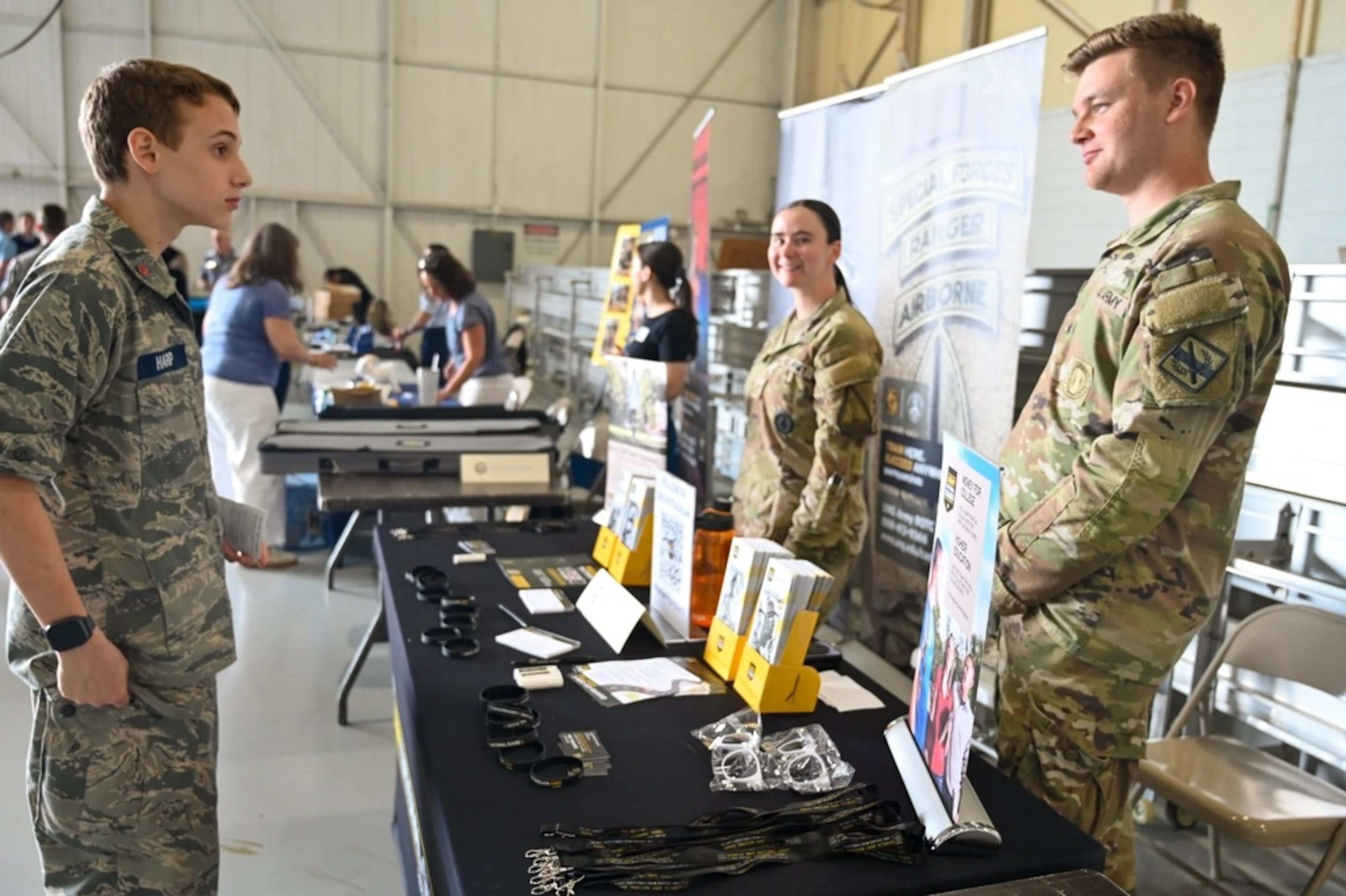 Representatives from the Army National Guard speak to a student during the 2025 Georgia Military Service Academy Day at Dobbins Air Reserve Base in Marietta on Saturday. (Courtesy of Maj. Stephani Schafer/U.S. Air Force)