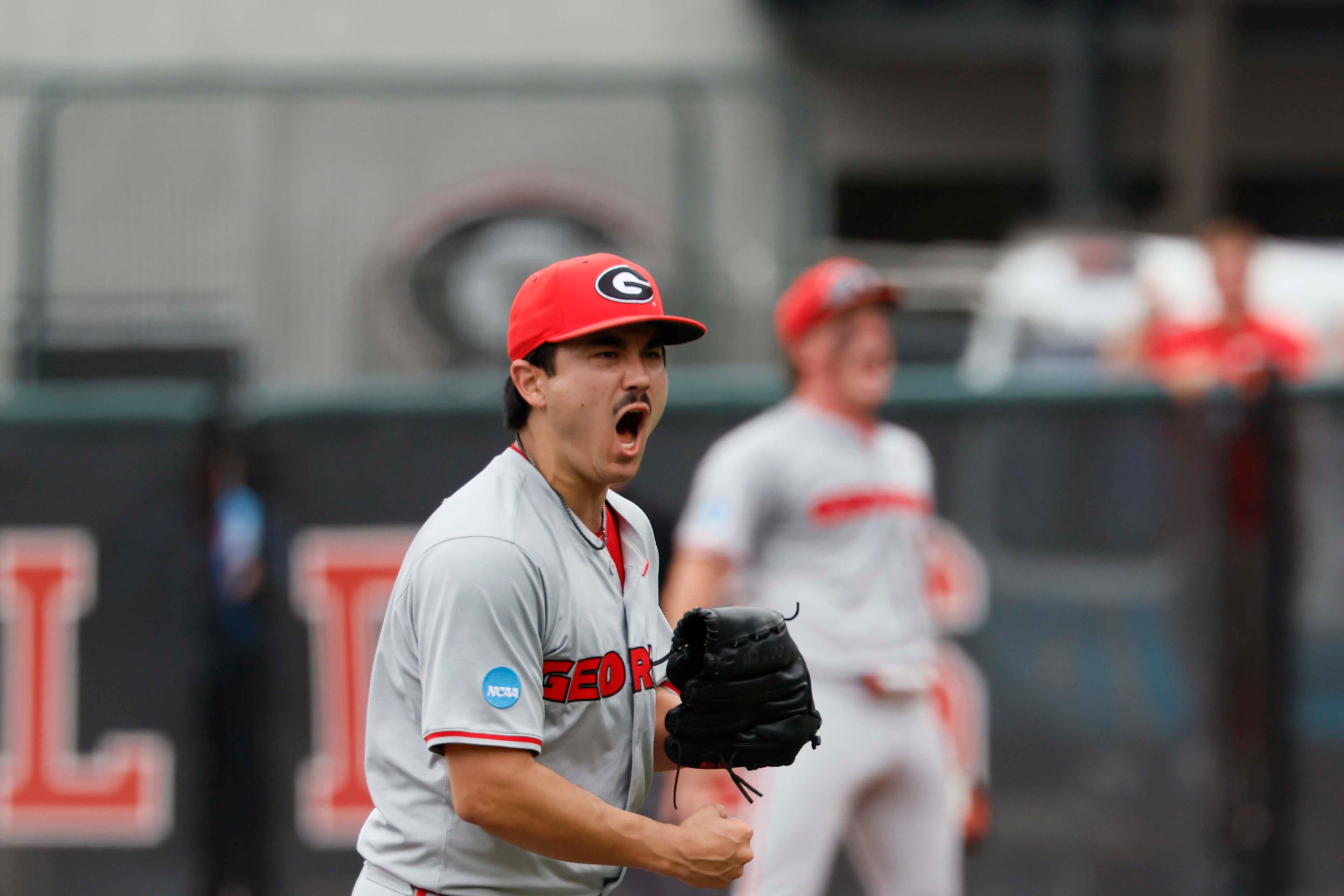 Georgia Bulldogs pitcher Caden Aoki (12) reacts after striking a batter during the sixth inning of Game 2 of the NCAA Super Regional at Foley Field on Sunday, June 7, 2026, in Athens. Miguel Martinez/AJC)Miguel Martinez/AJC)
