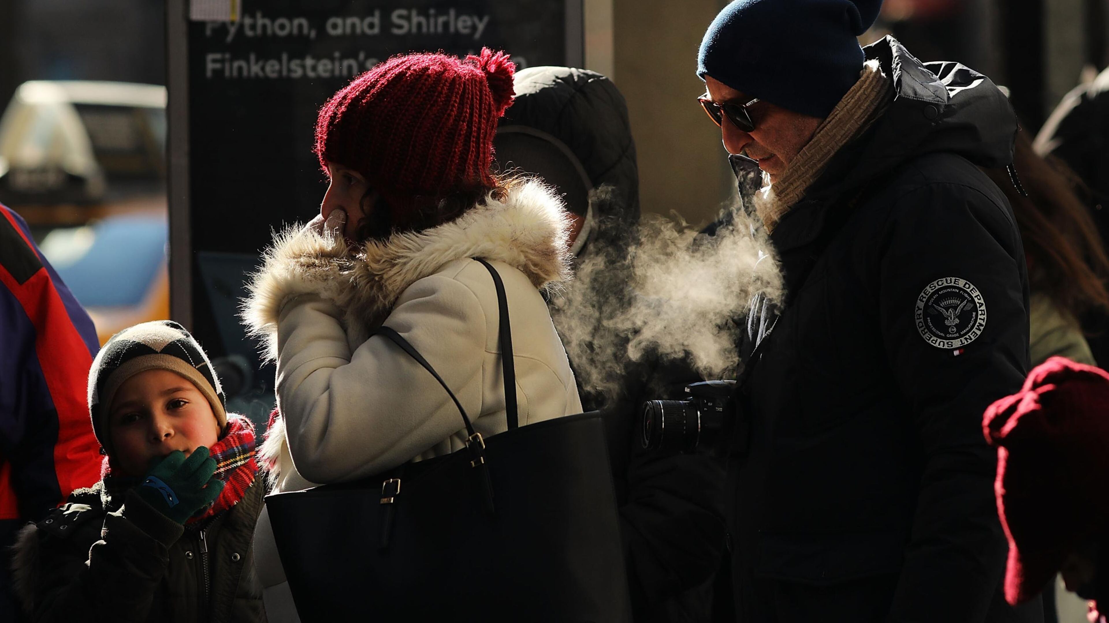 People walk through a frigid Manhattan on December 28, 2017 in New York City. Dangerously low temperatures and wind chills the central and eastern United States are making outdoor activity difficult for many Americans. Little relief from the below normal temperatures is expected the first week of the New Year. (Photo by Spencer Platt/Getty Images)