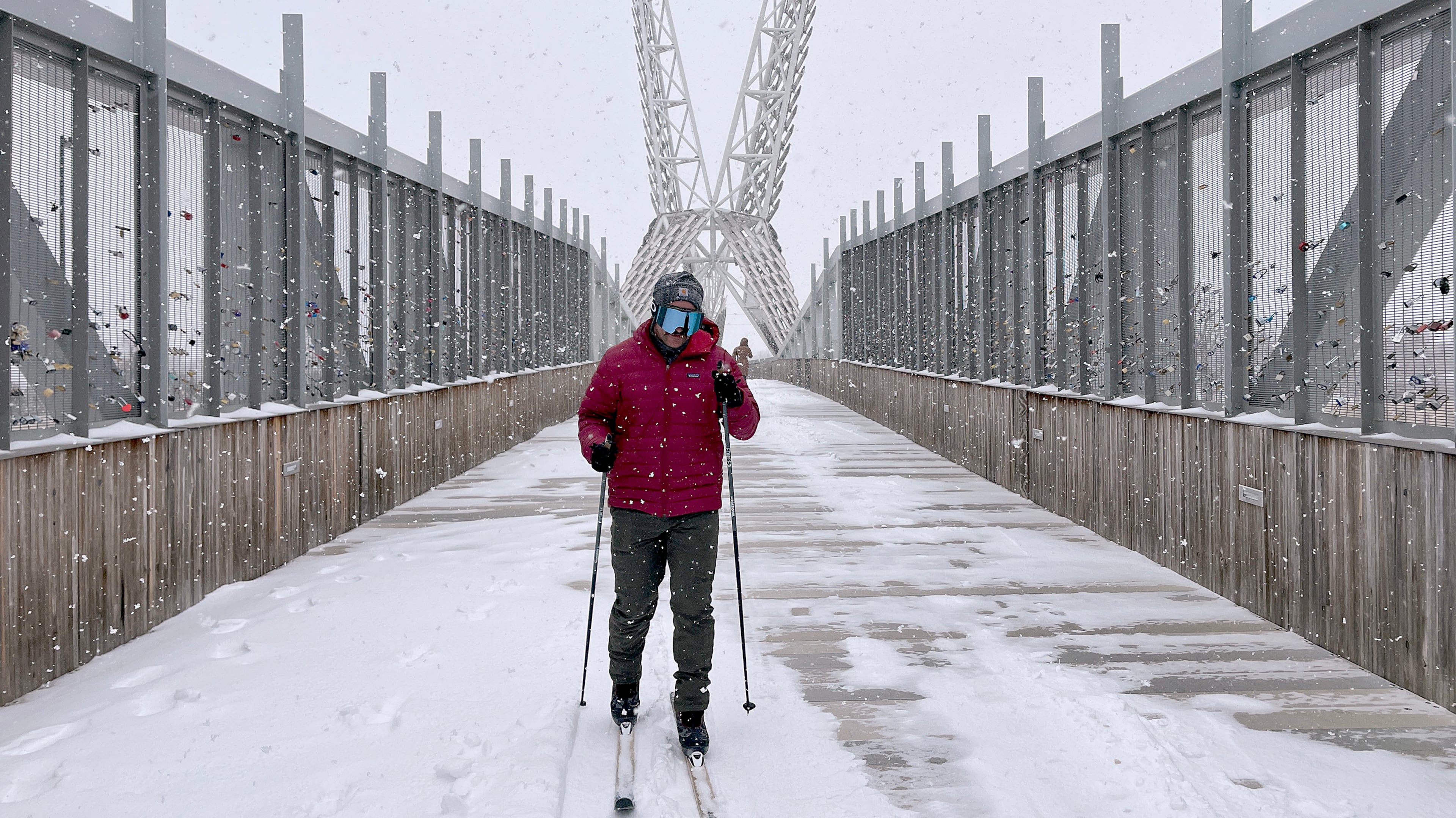 Jacob Coleman skis across SkyDance Bridge over Interstate 40 during a snowstorm in Oklahoma City on Saturday, Jan. 24, 2026. (AP Photo/Thomas Peipert)