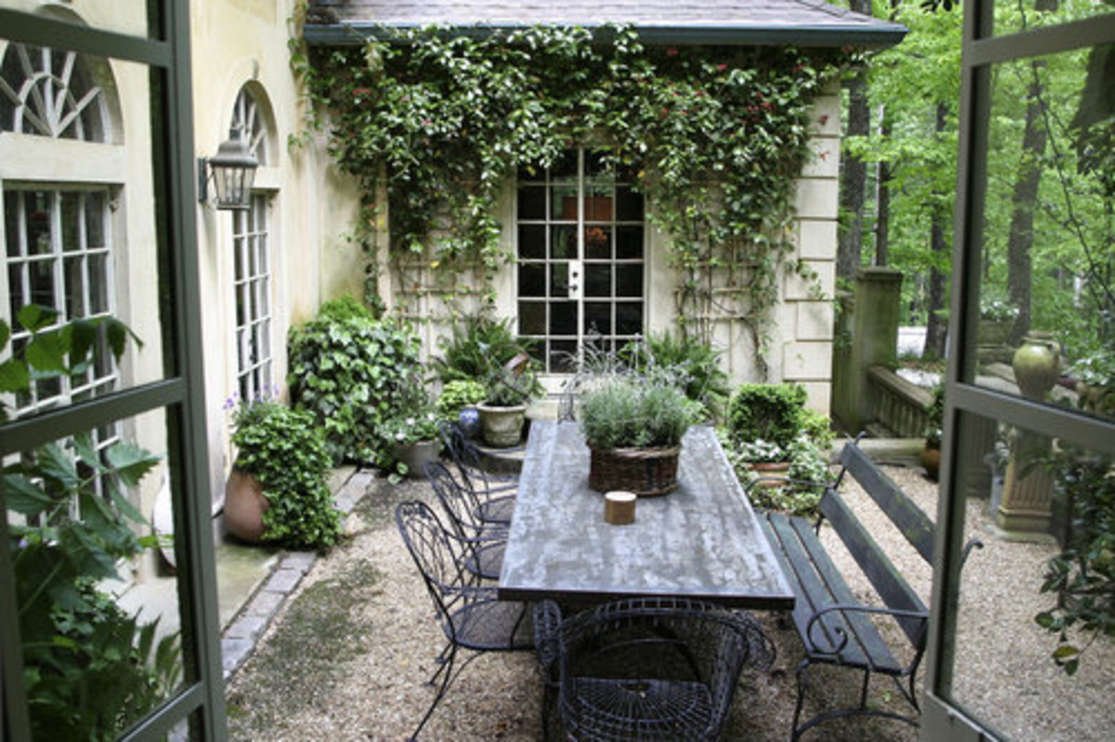 Renovations over the years have resulted in: new fireplaces, updated landscaping, updated electrical fittings, new floors and hardwood floors in the kitchen. The main courtyard is framed on three sides by large French doors that lead to the office, living room and library.