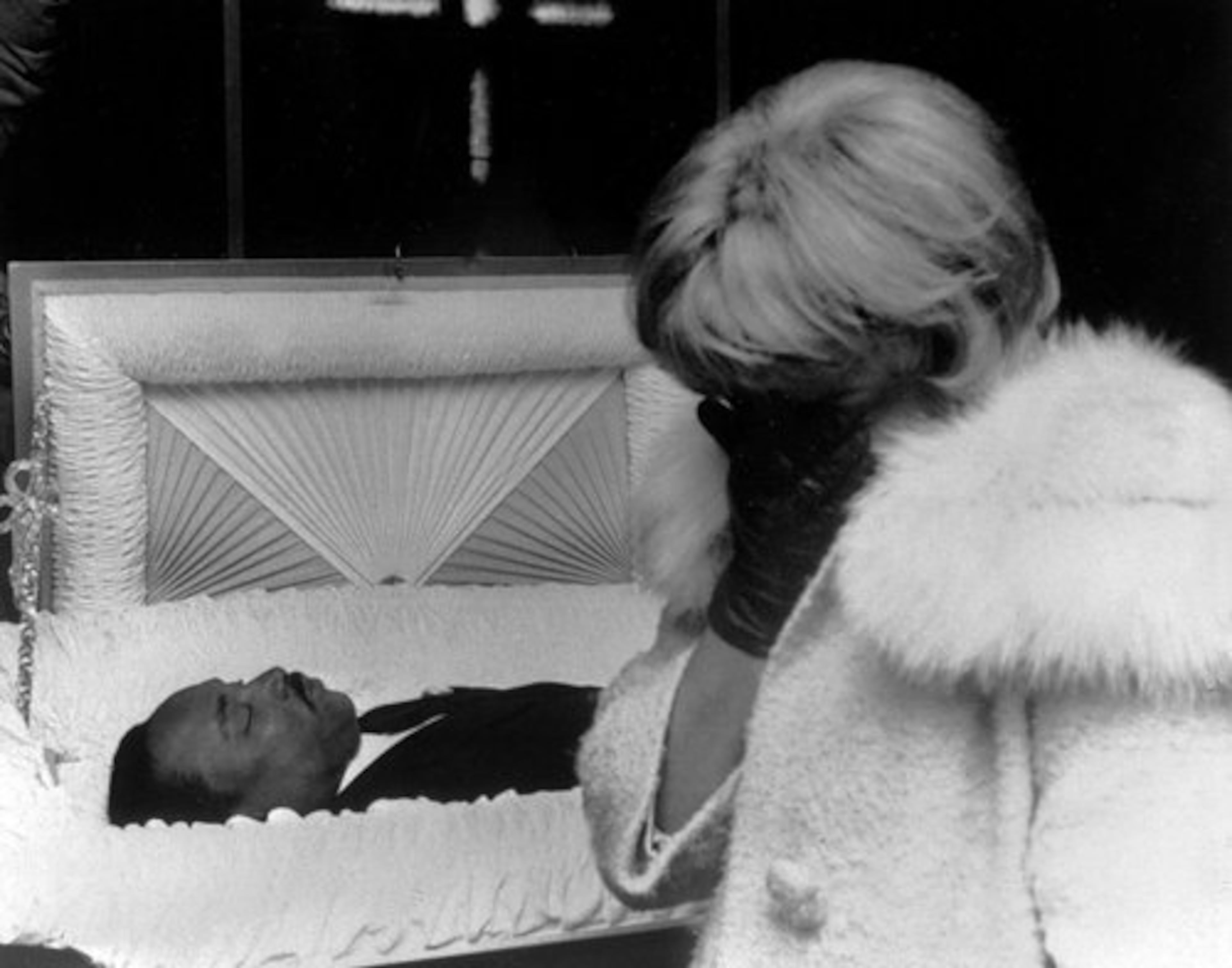 An unidentified woman weeps uncontrollably at Memphis funeral home early Friday morning, April 5, 1968 as hundreds of mourners filed past the body of Dr. Martin Luther King before it was to be sent to Atlanta. AP Wire Photo.
