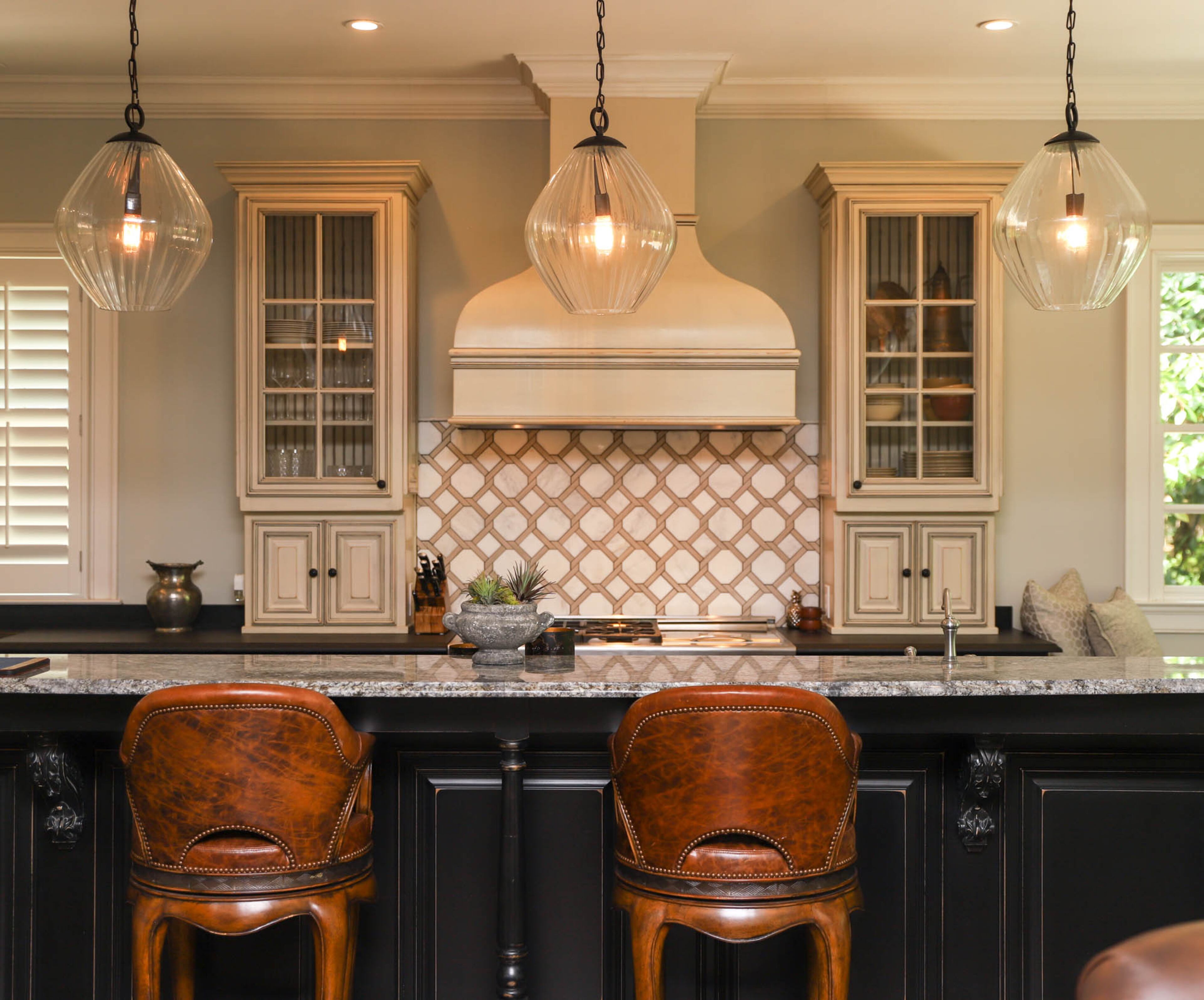 Homeowners David Diehl and Jason Warshaw love how their kitchen is open to the rest of the living area. "You can be working in the kitchen, but you're still effectively in the living room," said Warshaw. "You can move all around the space and still feel connected." The abundance of space on the granite countertops and the chef's gas range are also favorite features of the couple.