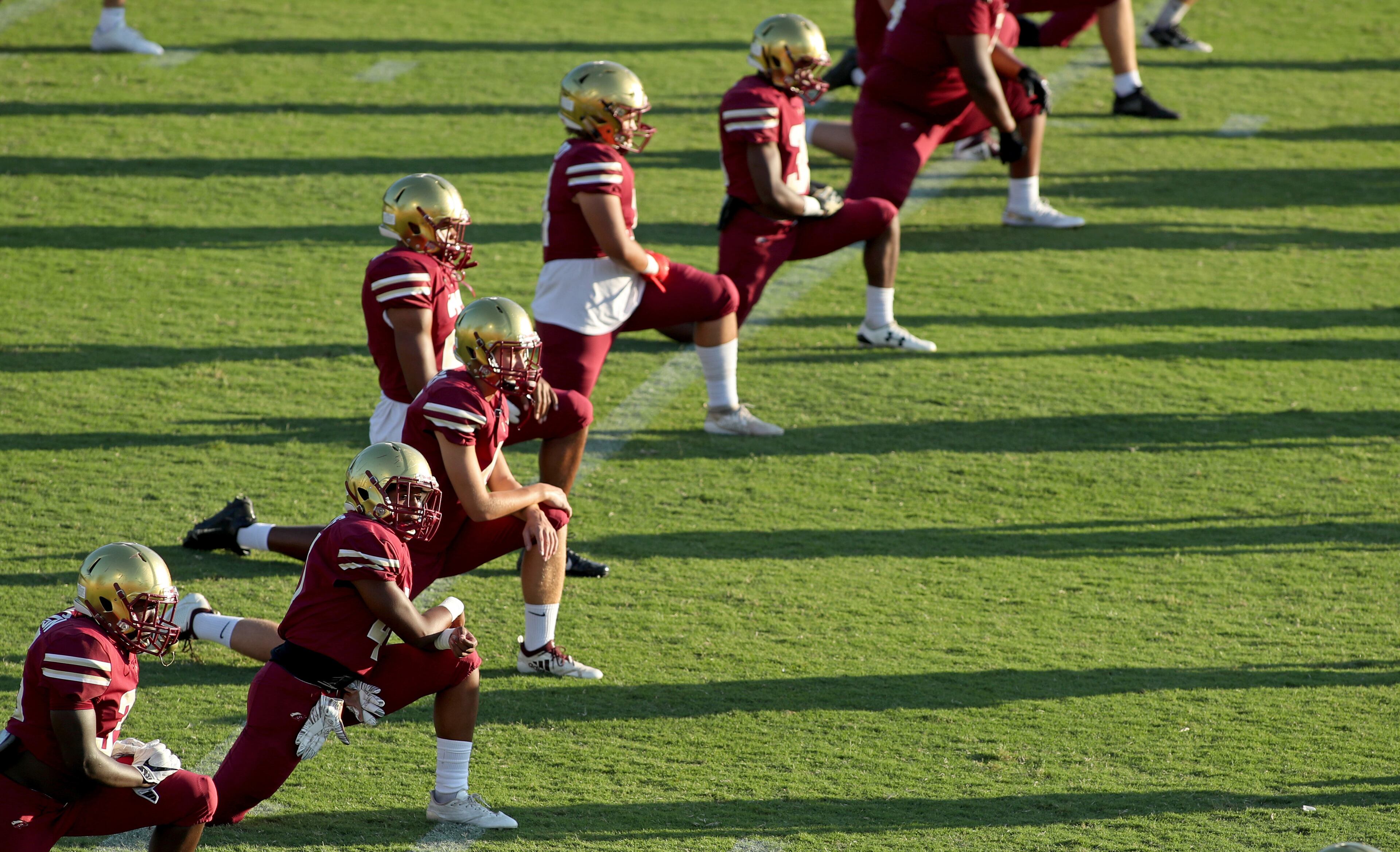 Brookwood players warmup before Friday's home game against South Gwinnett. (Jason Getz/Special)