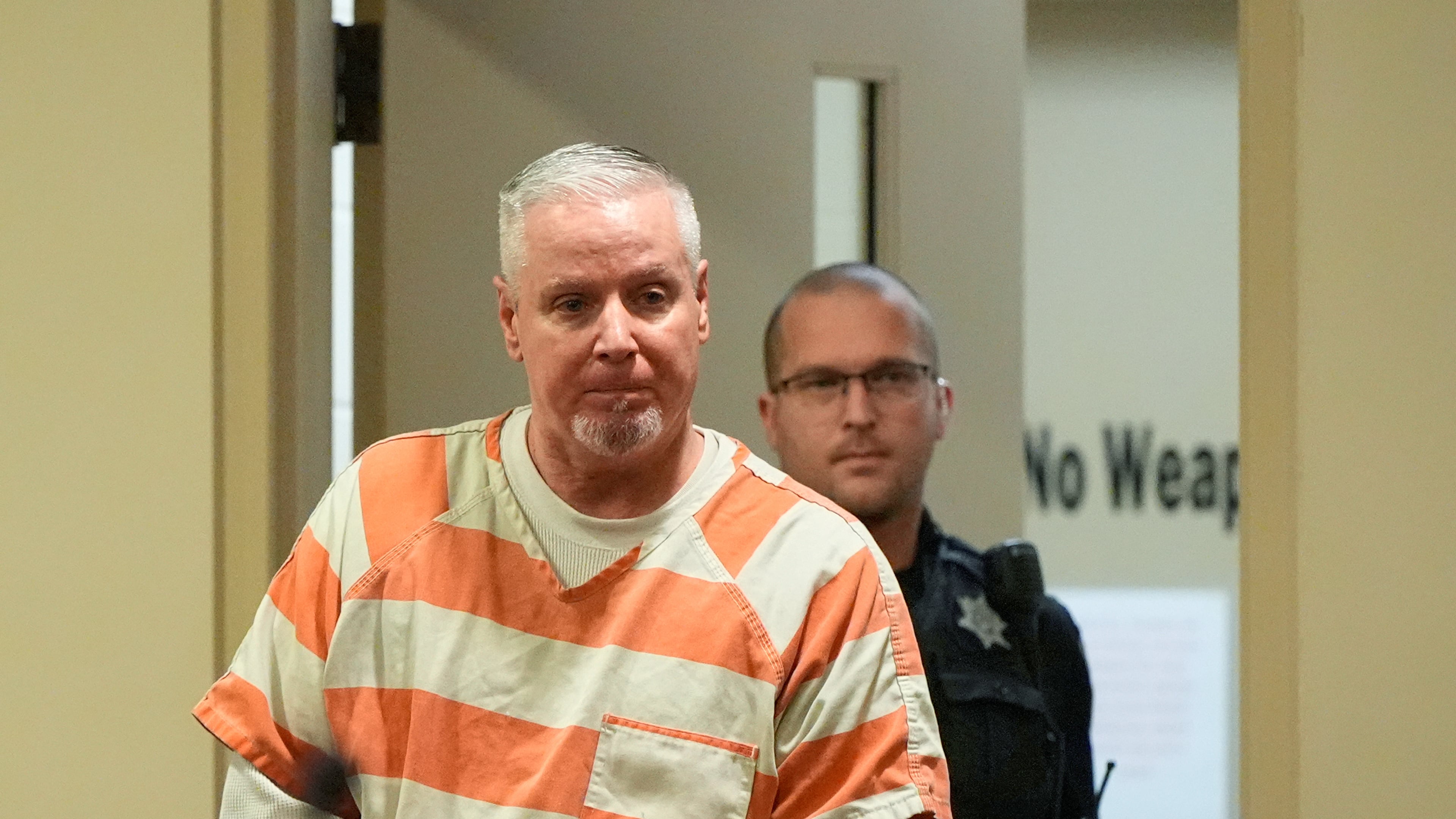 FILE - Colin Gray, the father of Apalachee High School shooting suspect Colt Gray, arrives to the courtroom at the Barrow County courthouse, Dec. 18, 2025, in Winder, Ga. (AP Photo/Brynn Anderson, File)