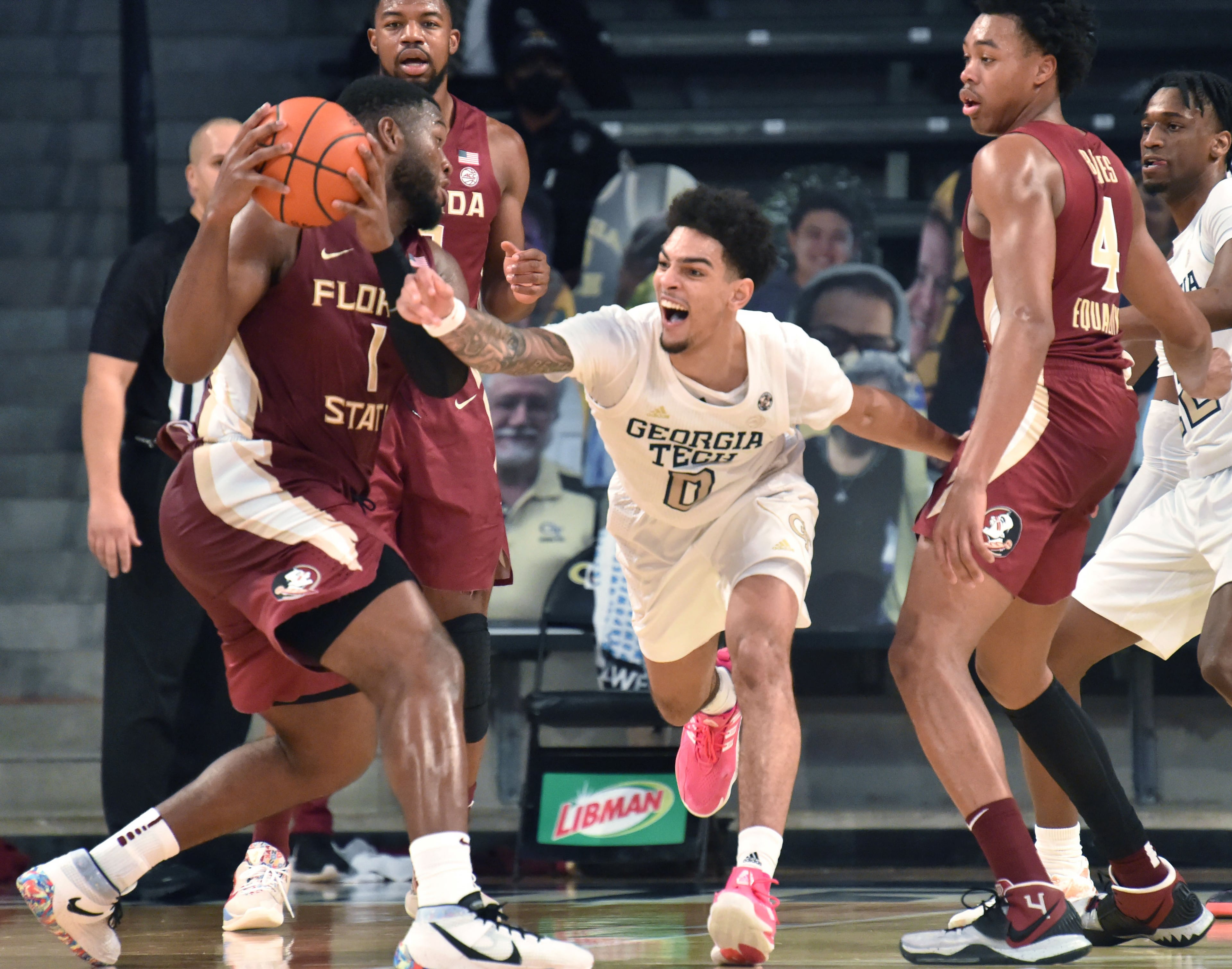 Georgia Tech's guard Michael Devoe (0) attempts to steal the basketball from Florida State's forward RaiQuan Gray (1). (Hyosub Shin / Hyosub.Shin@ajc.com)