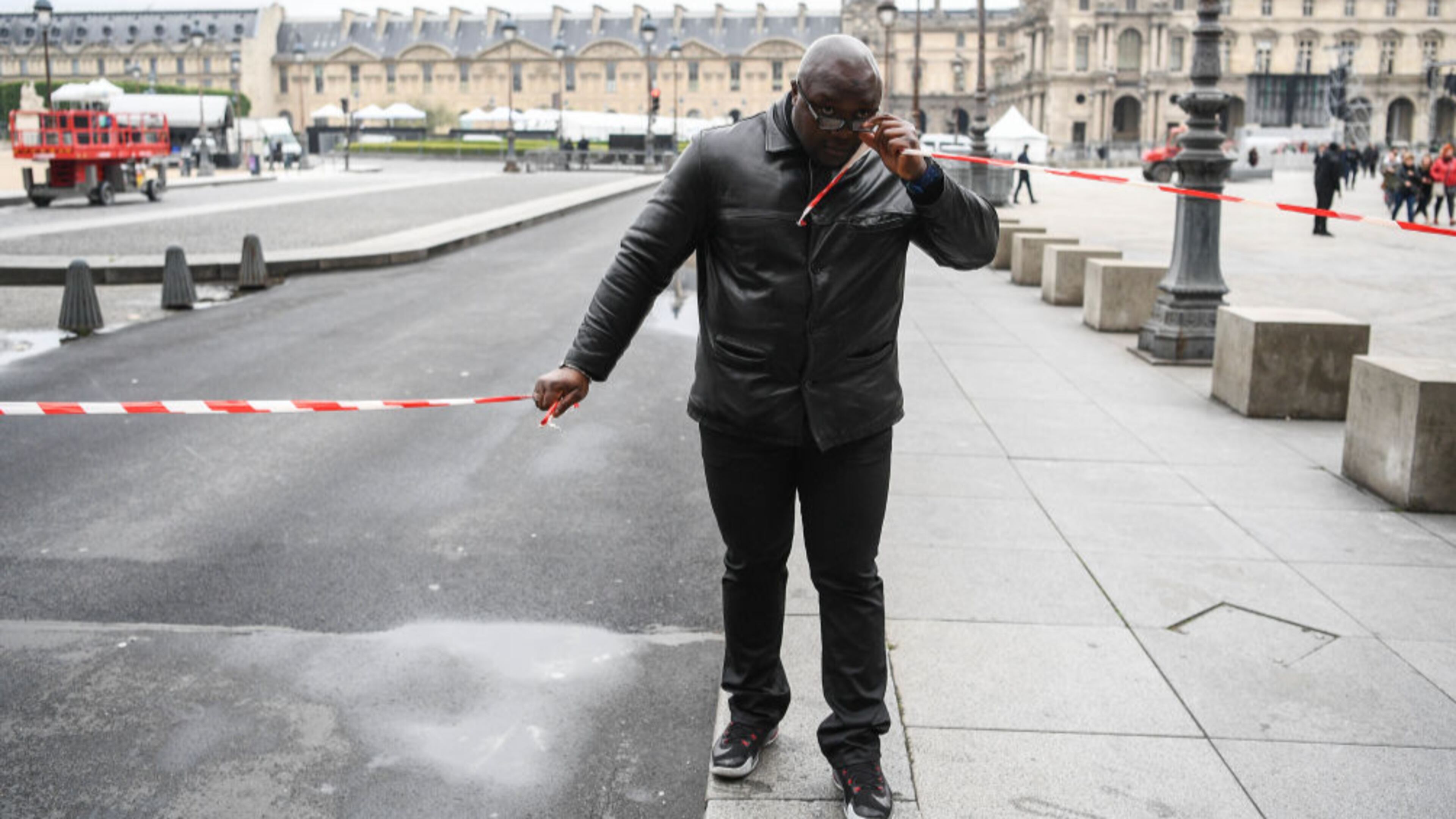 Security clear The Louvre following a bomb scare ahead of Emmanuel Macron's plans to celebrate here later should he win the French election on Sunday.