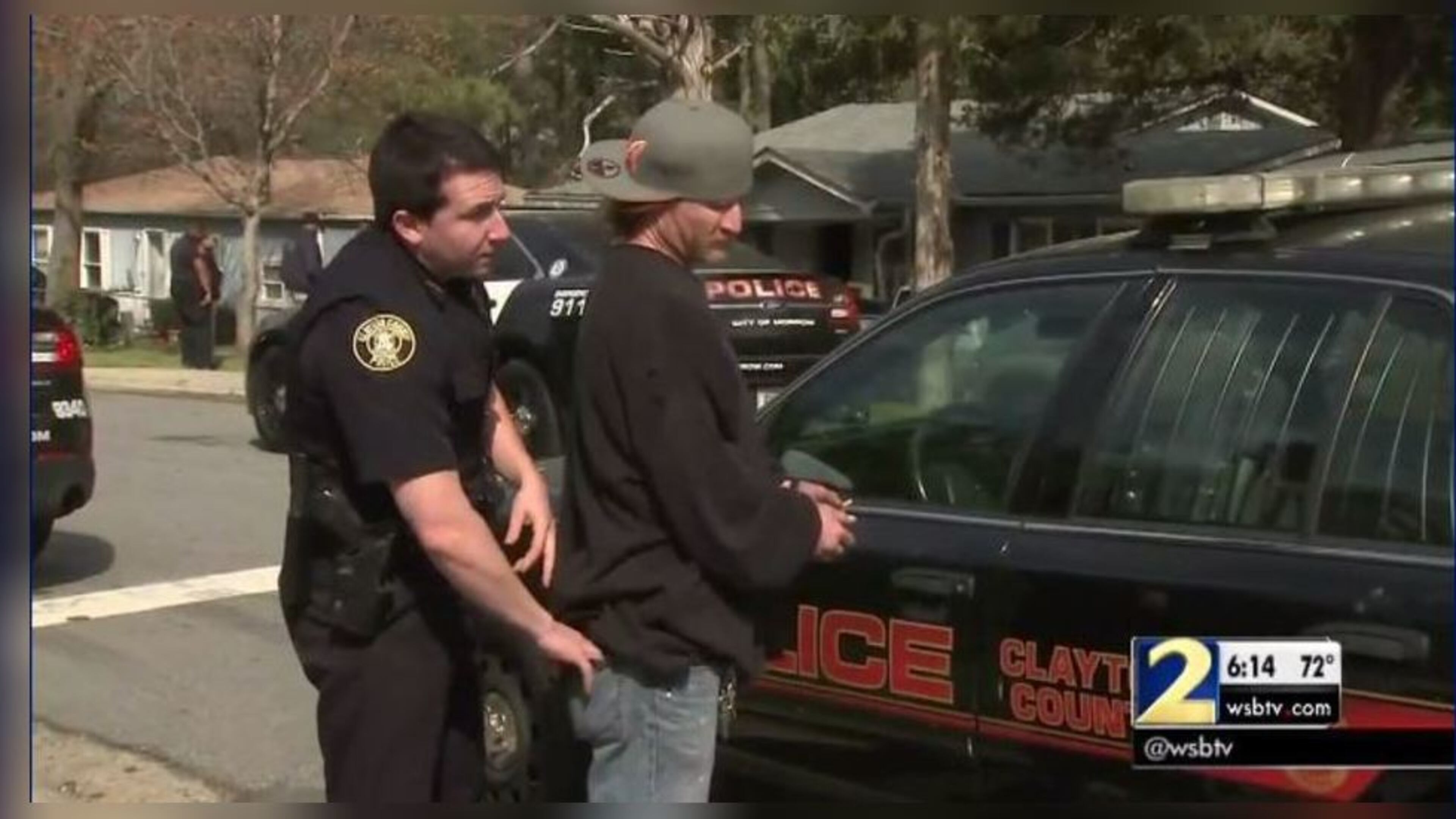 Police arrested and detained several people accused of running a chop shop. (Credit: Channel 2 Action News)