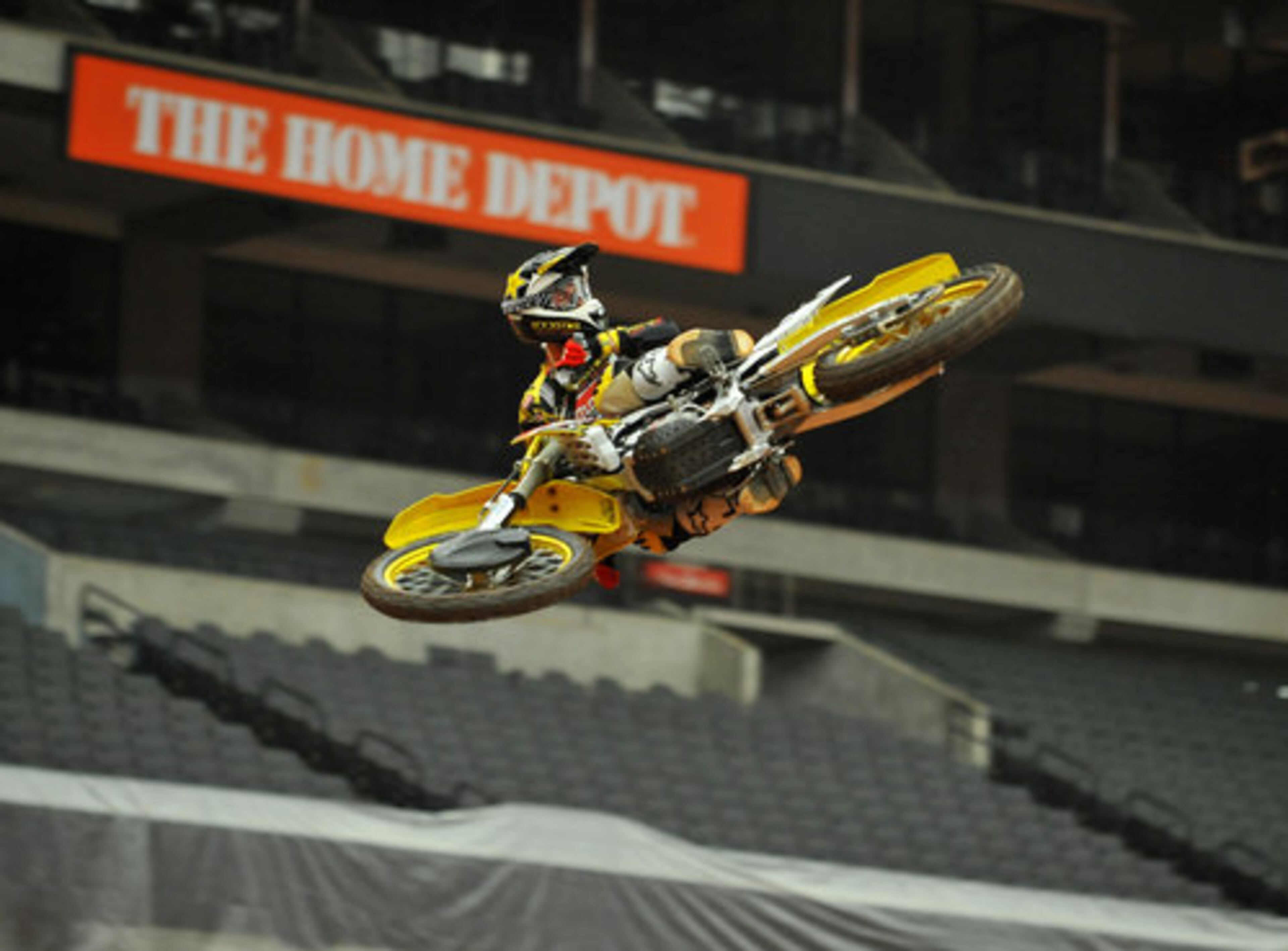 Brett Metcalfe whips his 450cc Suzuki dirt bike over a 70 foot triple jump during a test of the track at the Georgia Dome Thursday February 24, 2011. The world's top riders will compete Saturday in the Monster Energy AMA Supercross, an FIM World Championship.