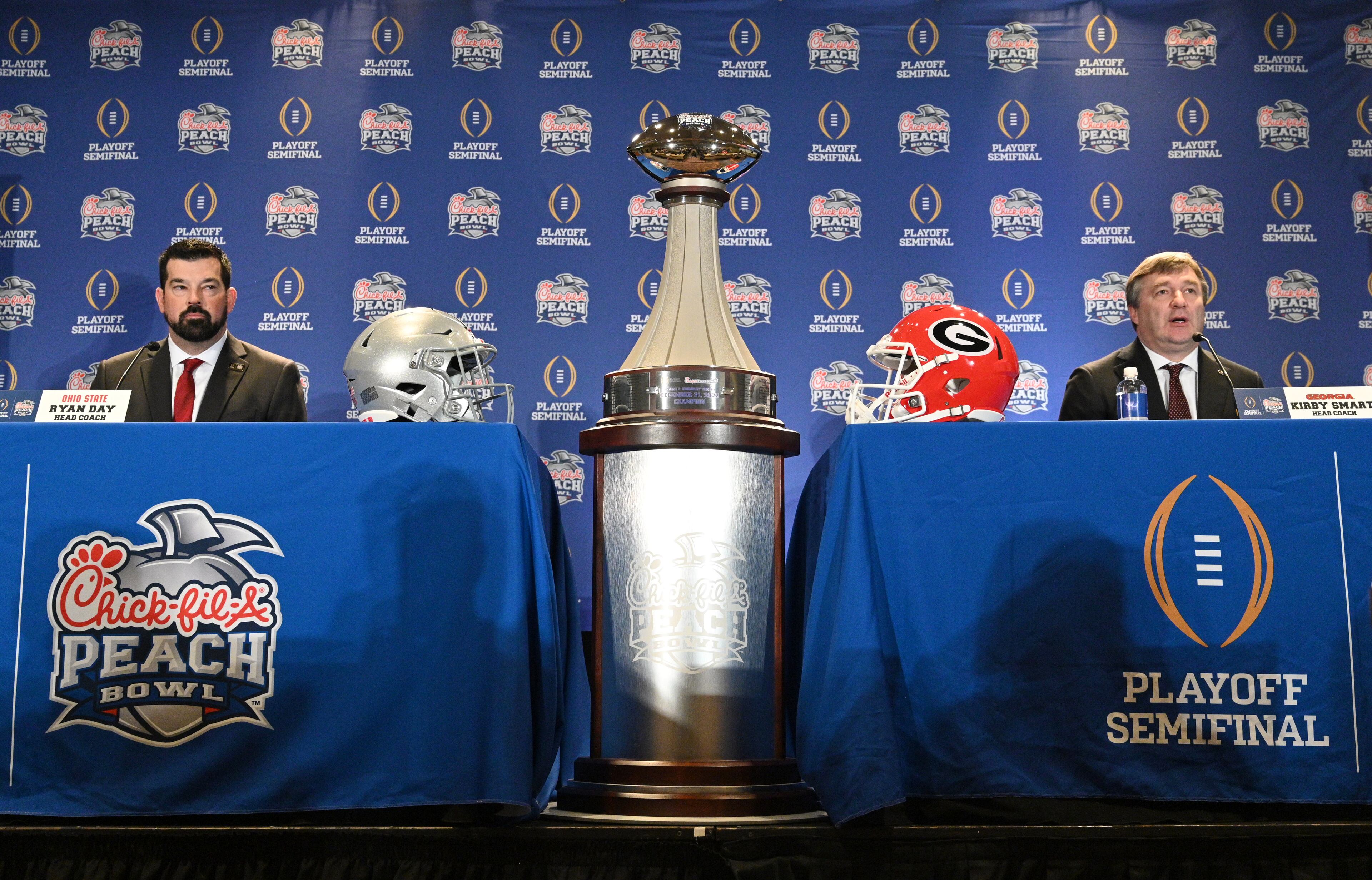 Ohio State's head coach Ryan Day (left) and Georgia's head coach Kirby Smart answer questions. (Hyosub Shin / Hyosub.Shin@ajc.com)