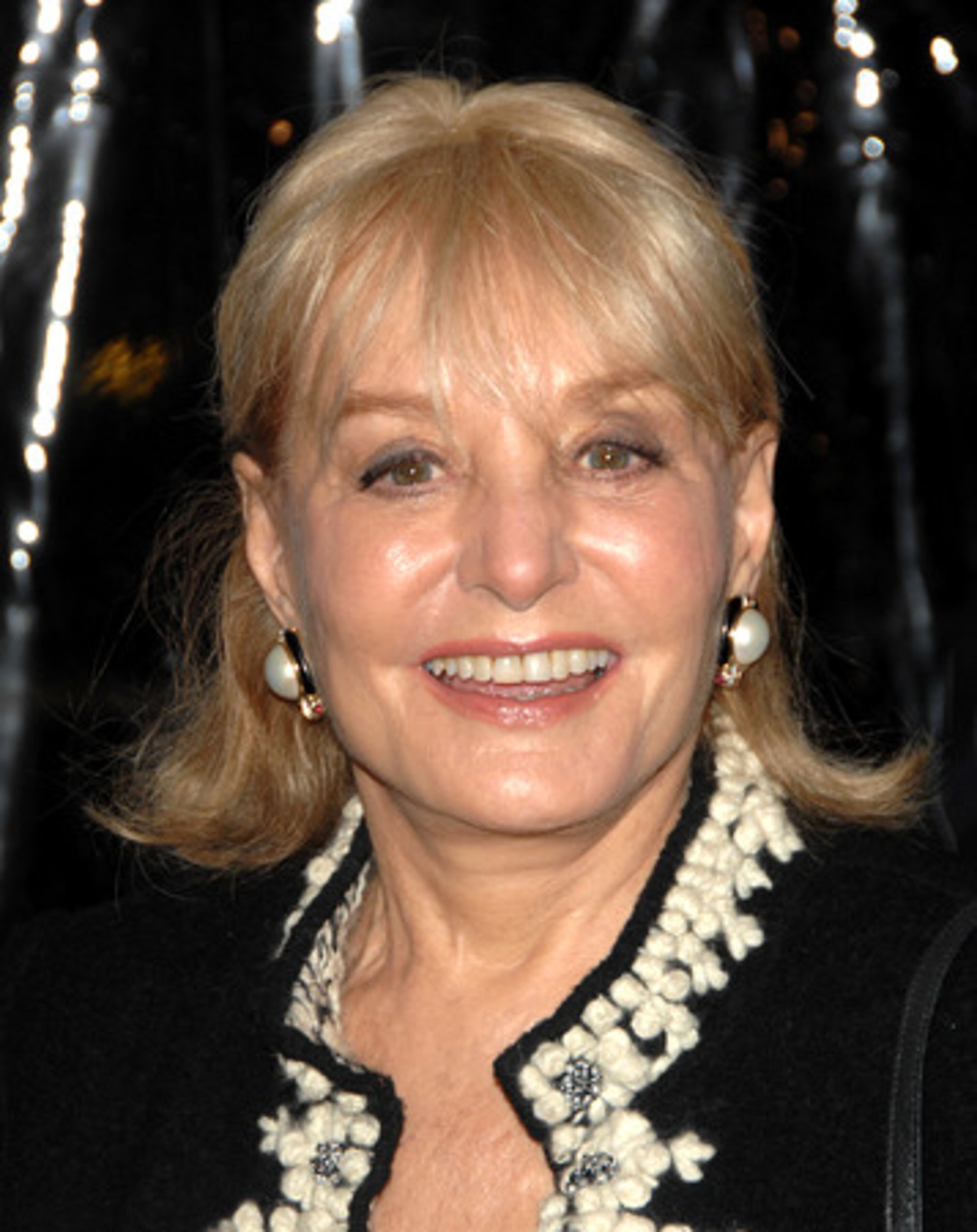 Barbara Walters arrives.