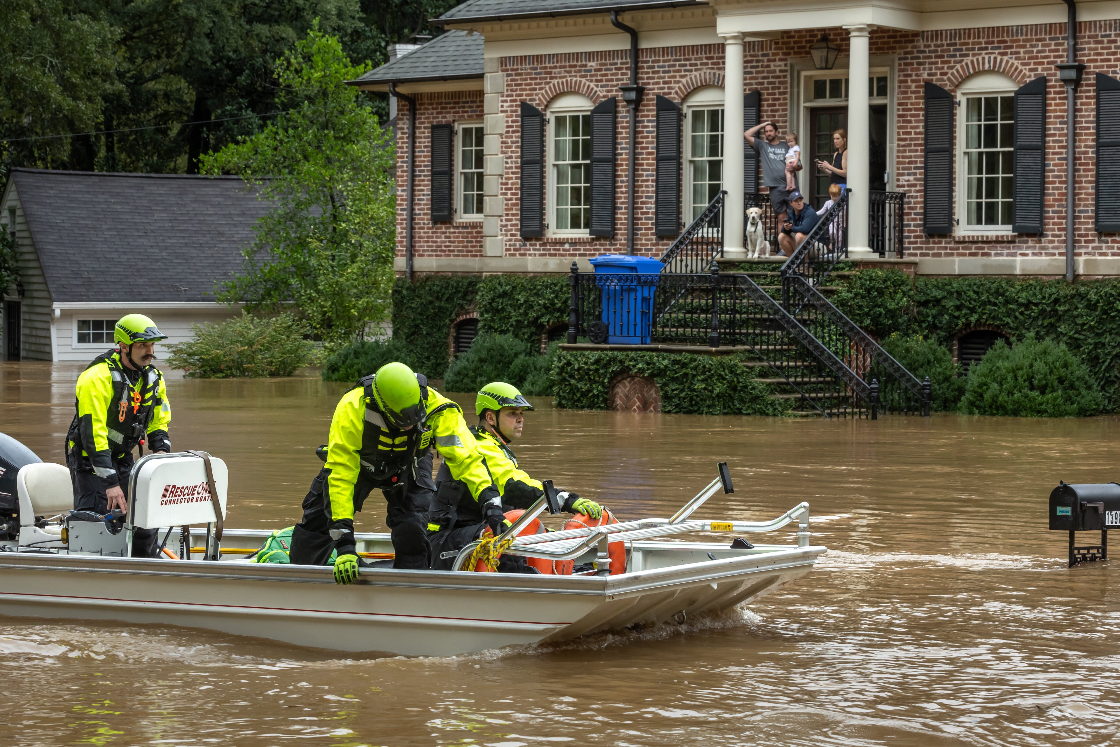 Atlanta Fire Rescue’s Dive/Swift Water Team performed welfare checks on residents on Hanover West Drive in Atlanta, after Helene entered Georgia as a Category 2 hurricane Sept. 27, 2024 and then was downgraded to a tropical storm. It brought a lot of problems to Atlanta with numerous water rescues and incessant rain. (John Spink/AJC)