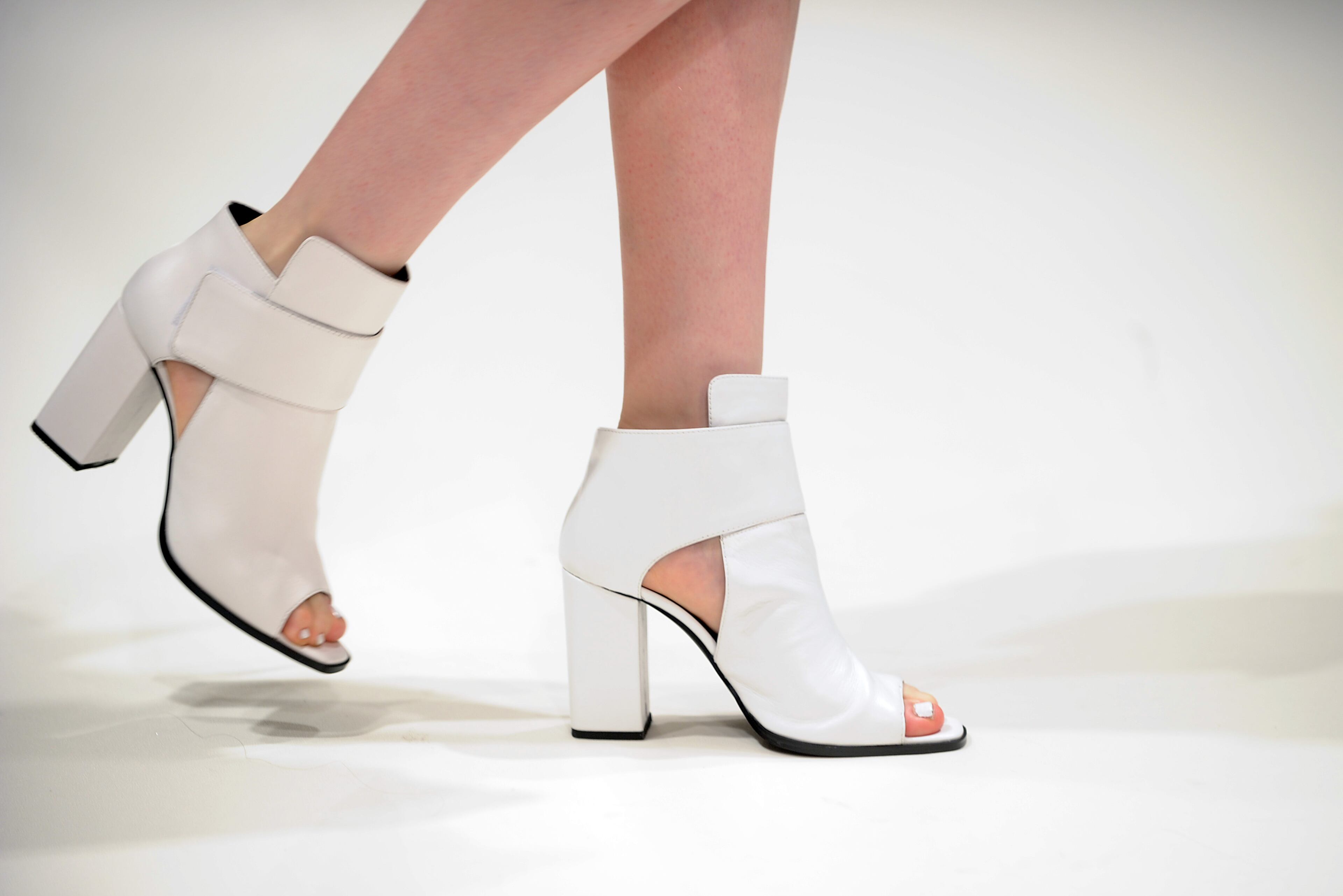 A model walks the runway at the Yifang Wan show during at the Fashion Scout venue during London Fashion Week SS14 at Freemasons Hall on September 13, 2013 in London, England.