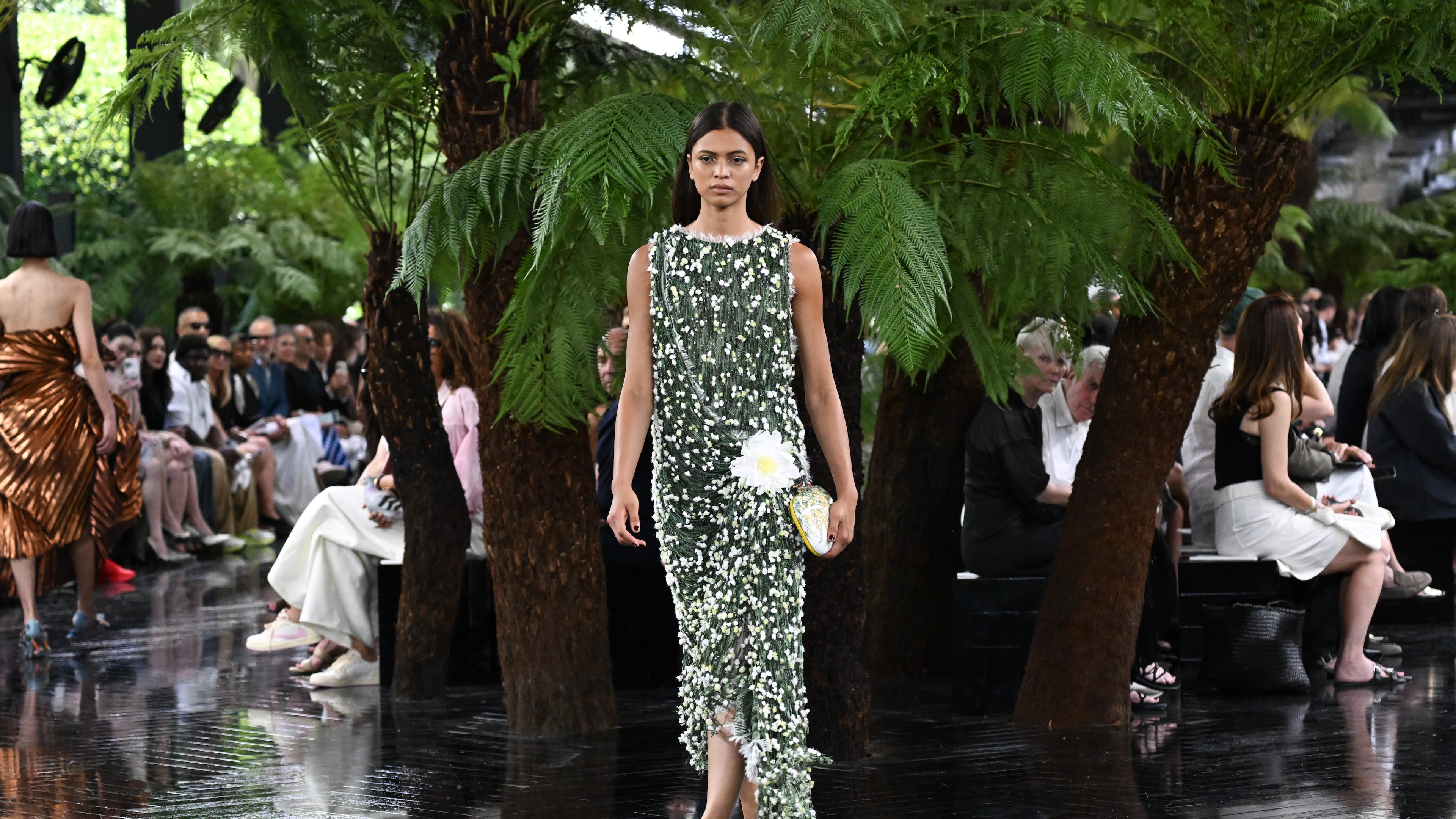 A model wears a creation as part of the Christian Dior Haute Couture Fall/Winter 2026-2027 Women's collection presented in Paris, Monday, July 6, 2026. (AP Photo/Emma Da Silva)