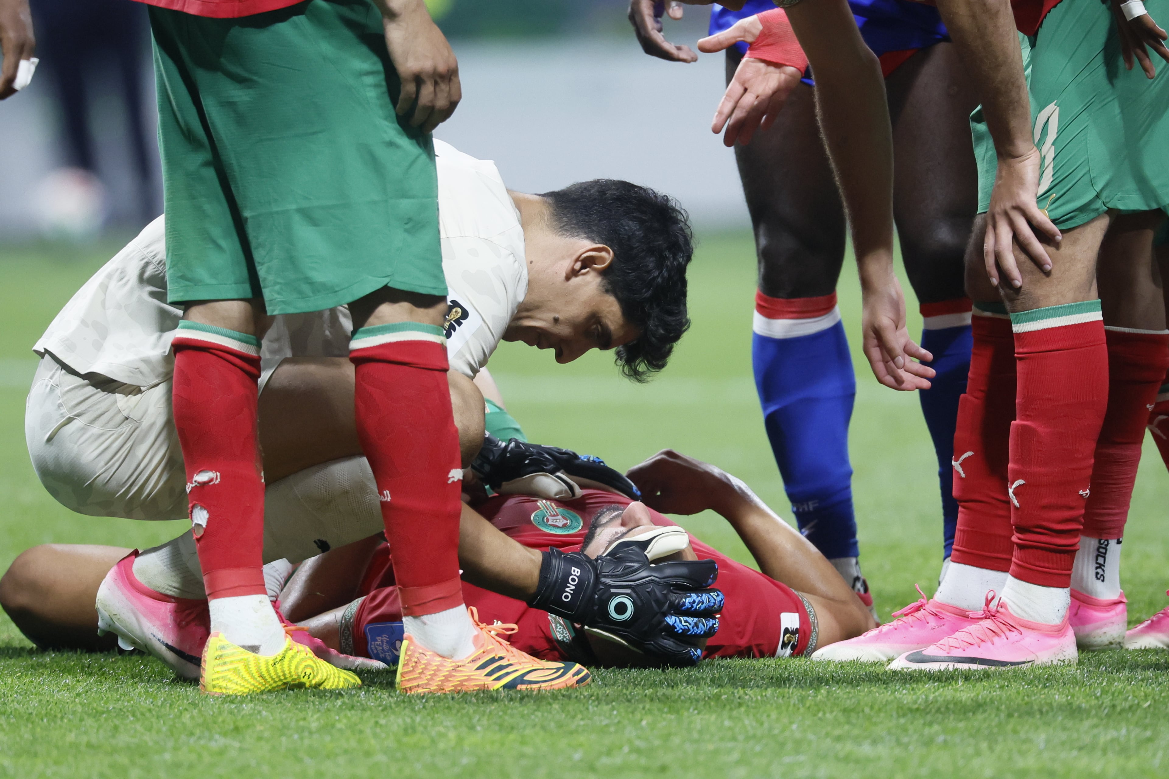 Morocco goalkeeper Yassine Bounou consoles Morocco's Sofyan Amrabat during injury timeout during second half of Morocco vs. Haiti Group C FIFA World Cup match at Atlanta Stadium (Mercedes-Benz Stadium) on Wednesday, June 24, 2026. (Miguel Martinez/AJC)