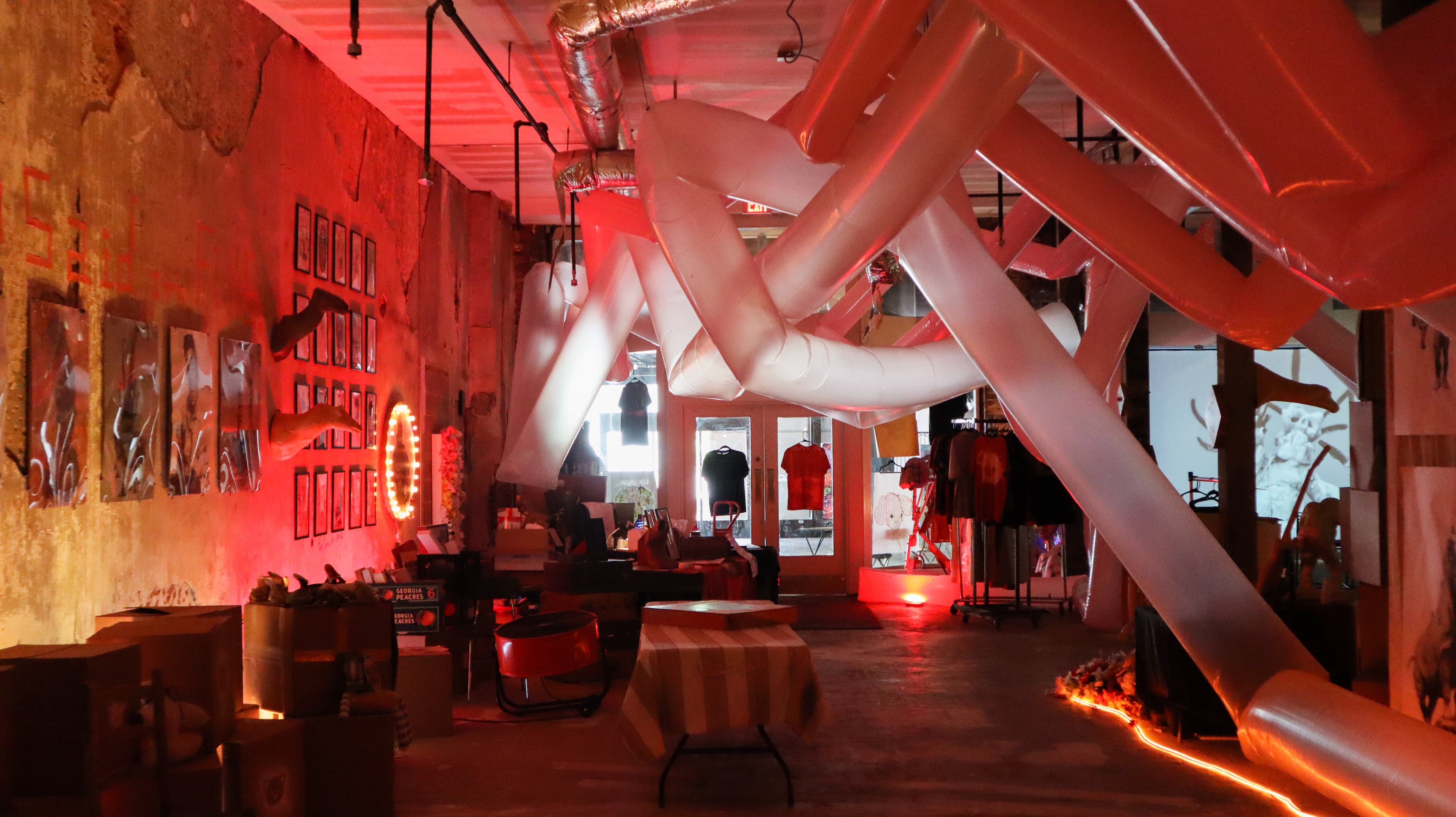 At night, Mike Stasny’s gallery transforms into the backdrop for live music shows put on by Face of Knives and other local promoters.