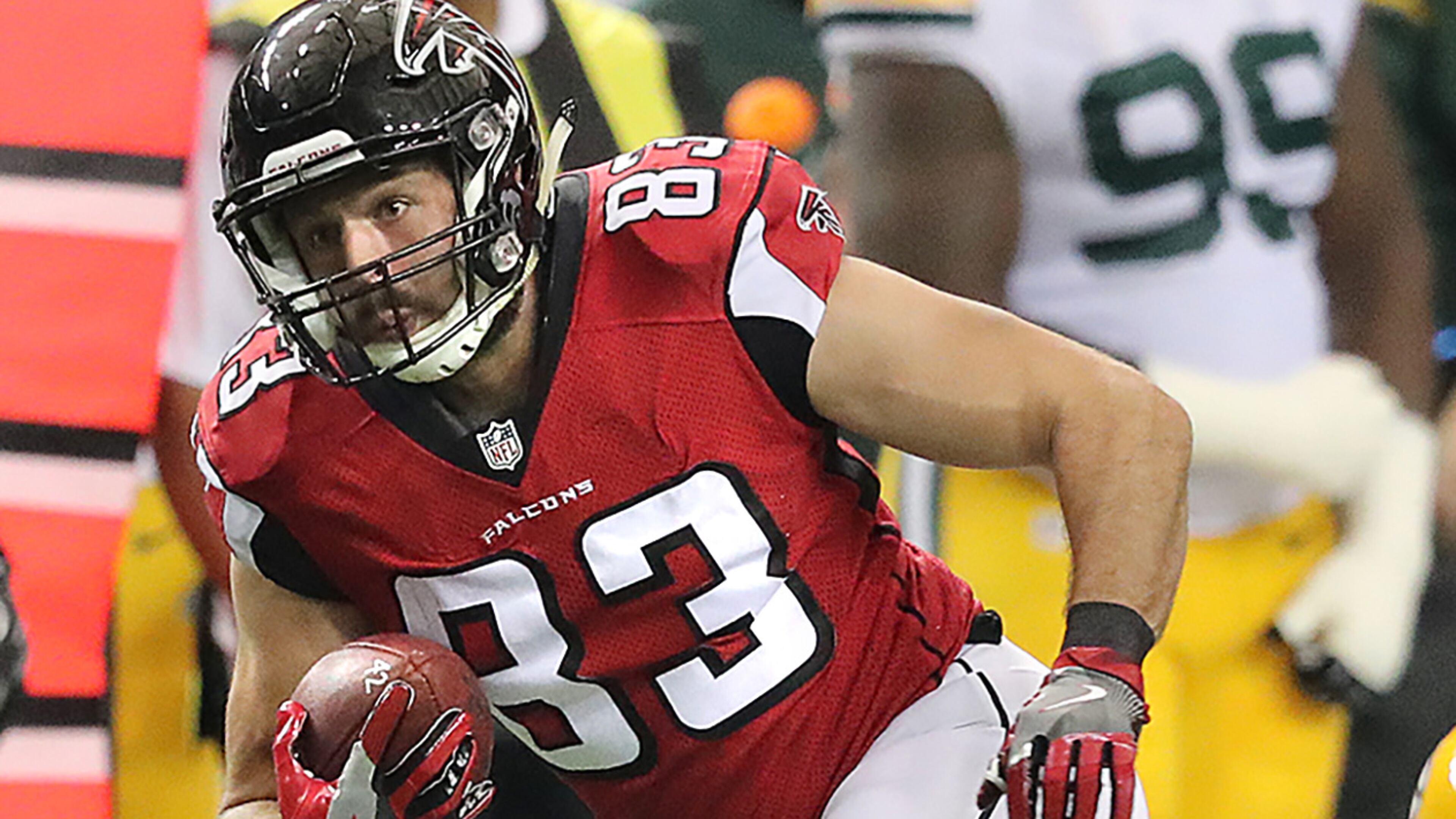 October 30, 2016 ATLANTA: Falcons tight end Jacob Tamme picks up yardage after catching a pass against the Packers during the first half in an NFL football game on Sunday, Oct. 30, 2016, in Atlanta. Curtis Compton /ccompton@ajc.com